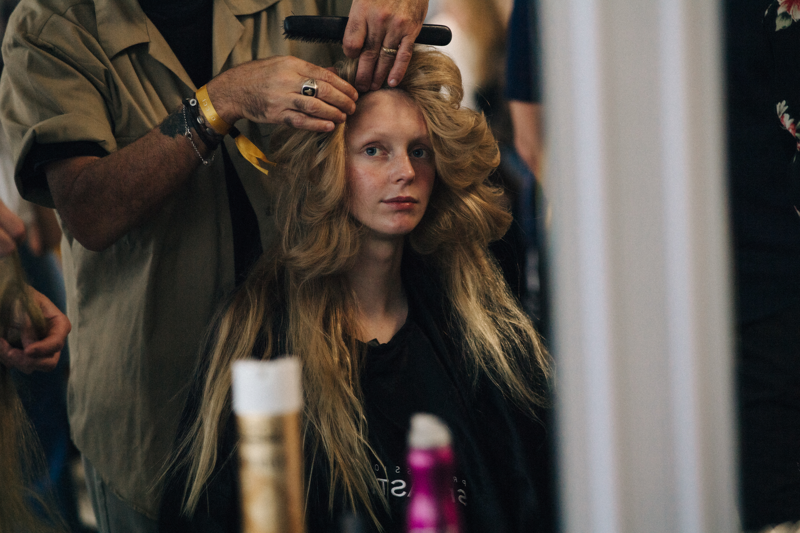 Model in hair and makeup backstage