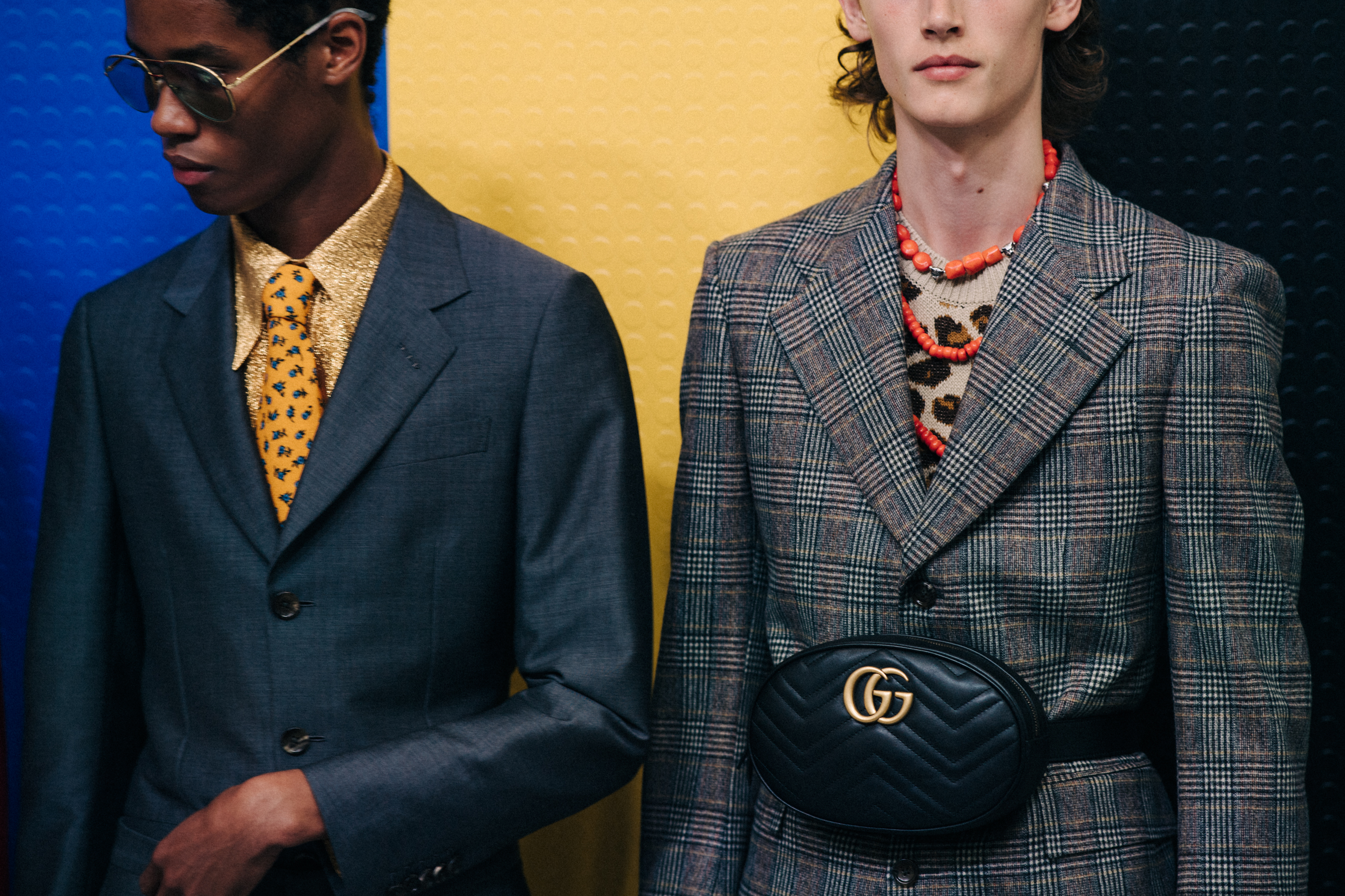 Crop of models backstage at Gucci