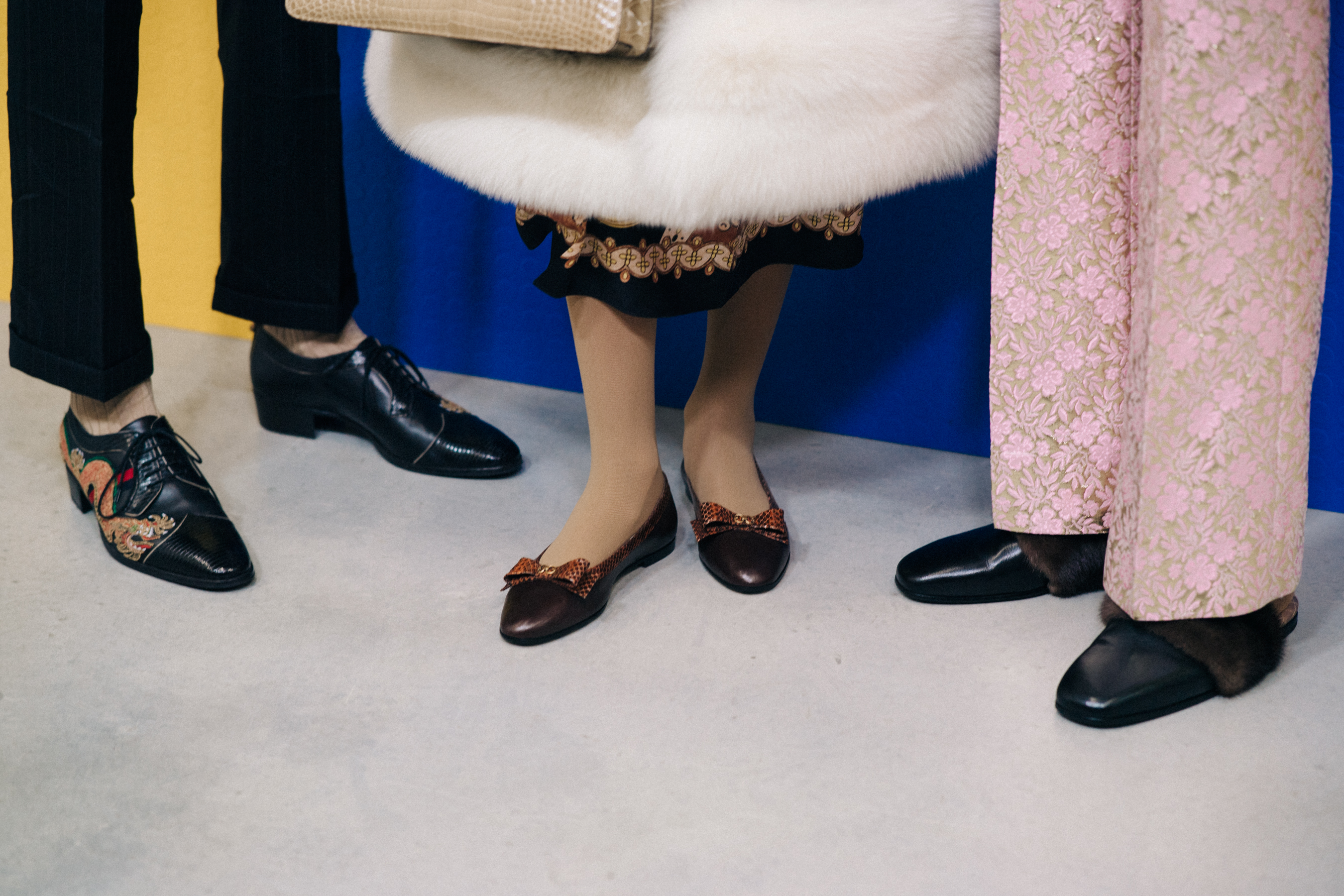 Three models feet backstage