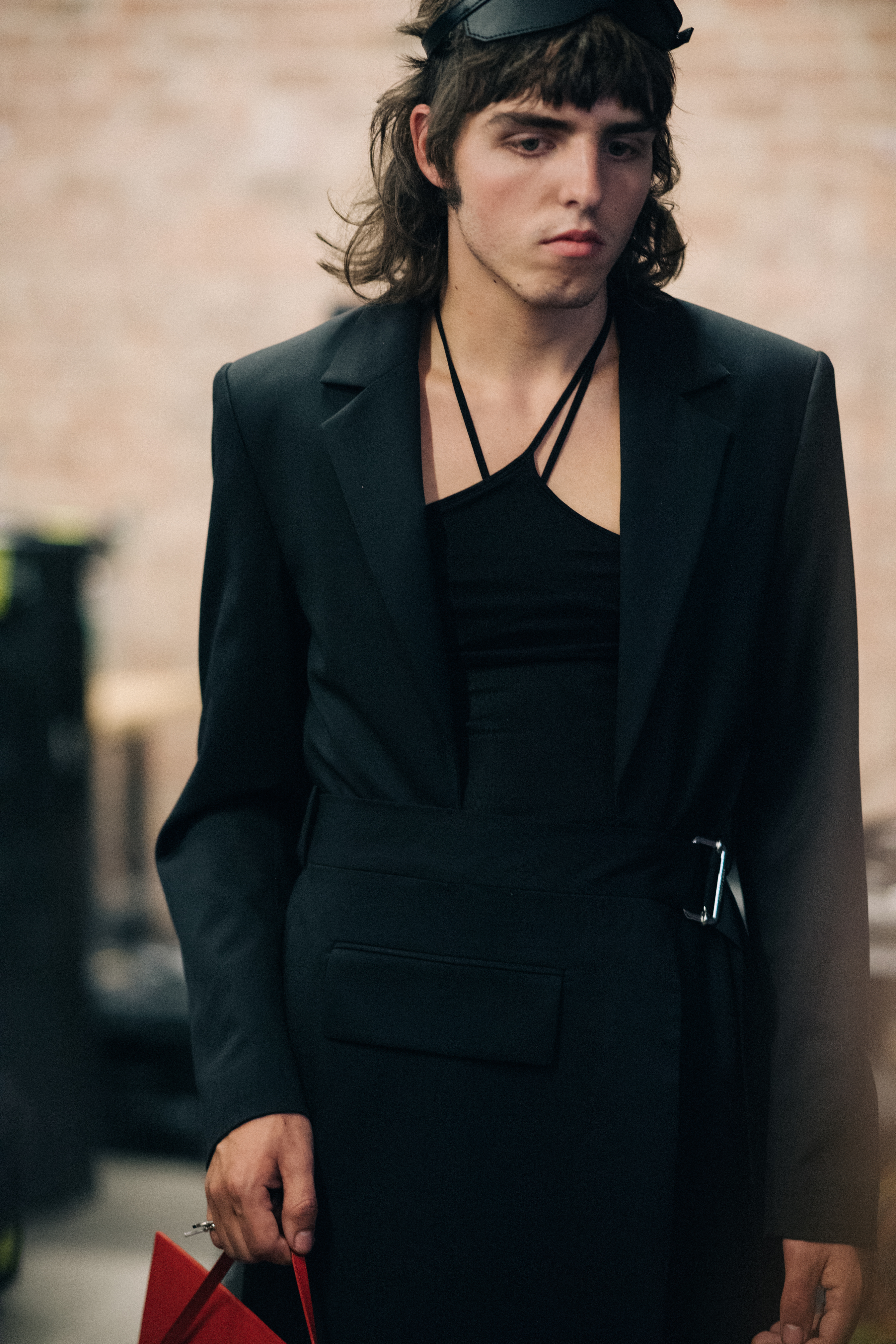 Male model wearing black suit