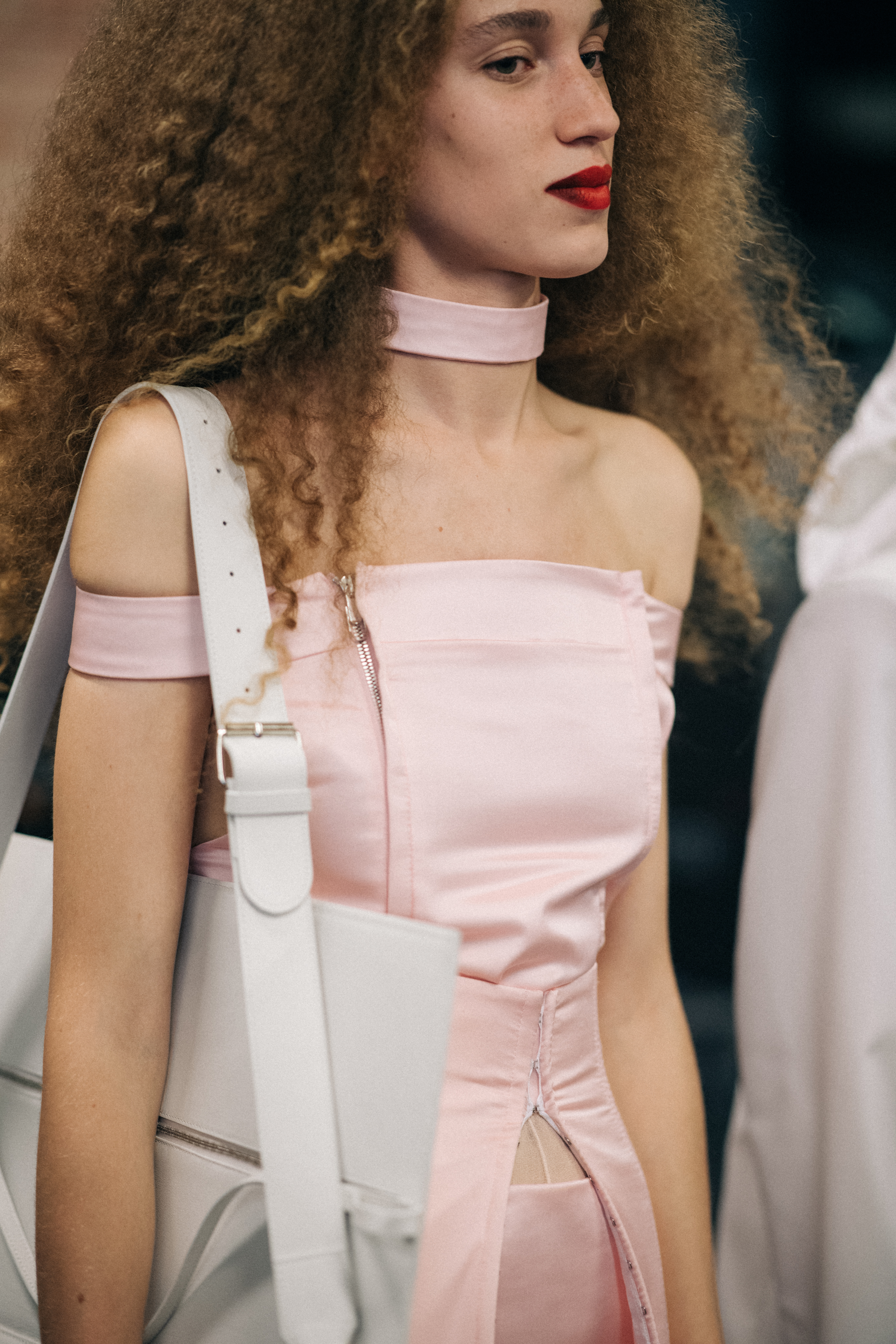 Model wearing pink dress
