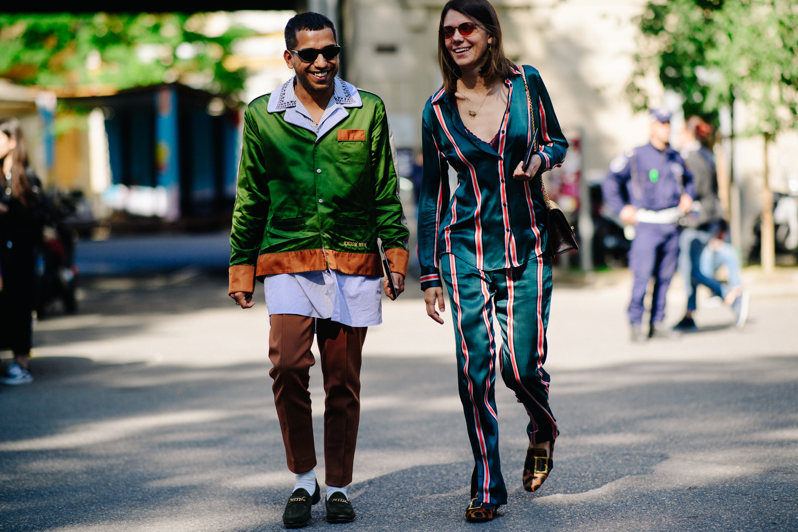 Couple walking in colourful outfits