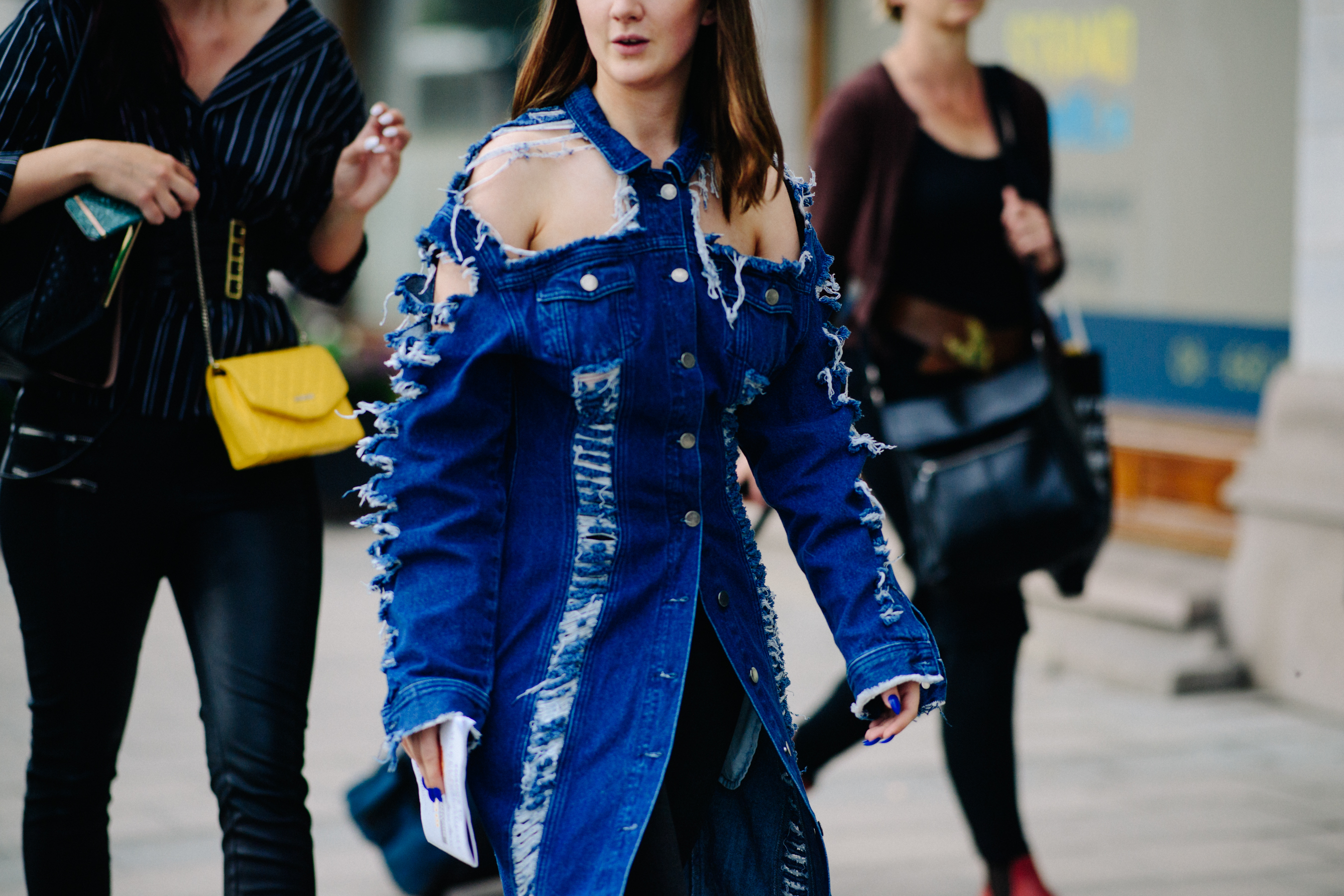 Woman wearing deconstructed denim jacket