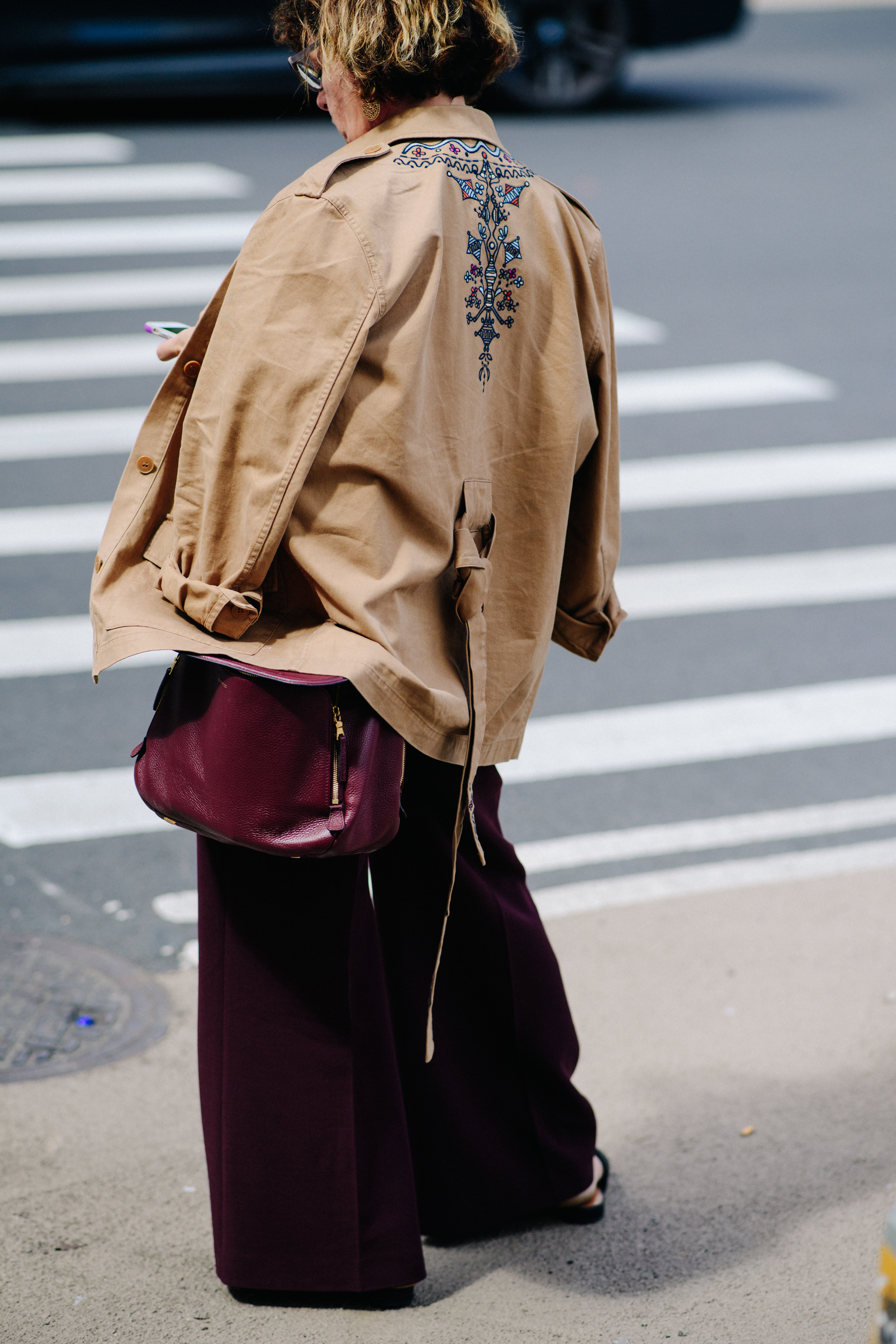 Woman wearing beige oversized jacket