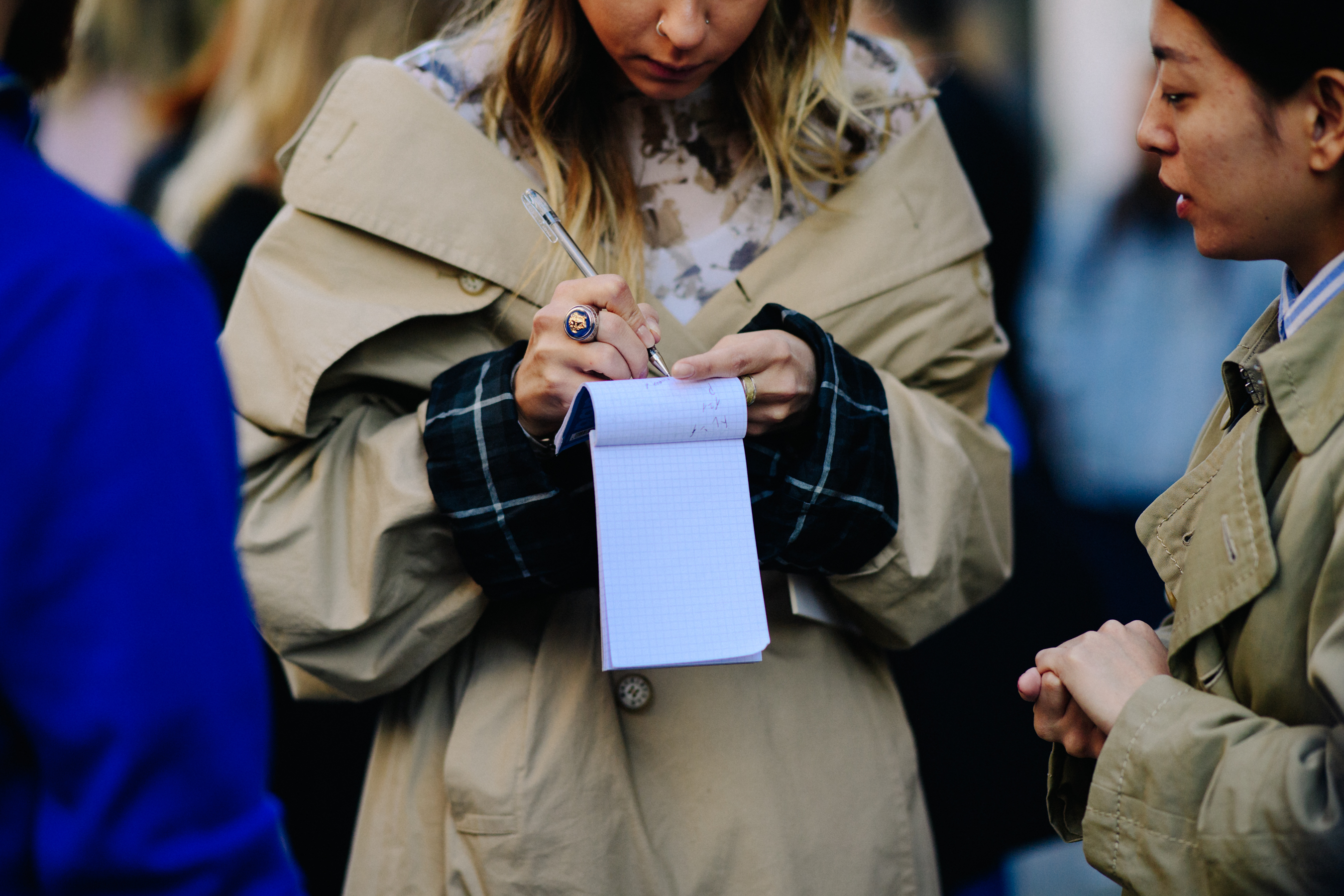 Woman writing in notebook