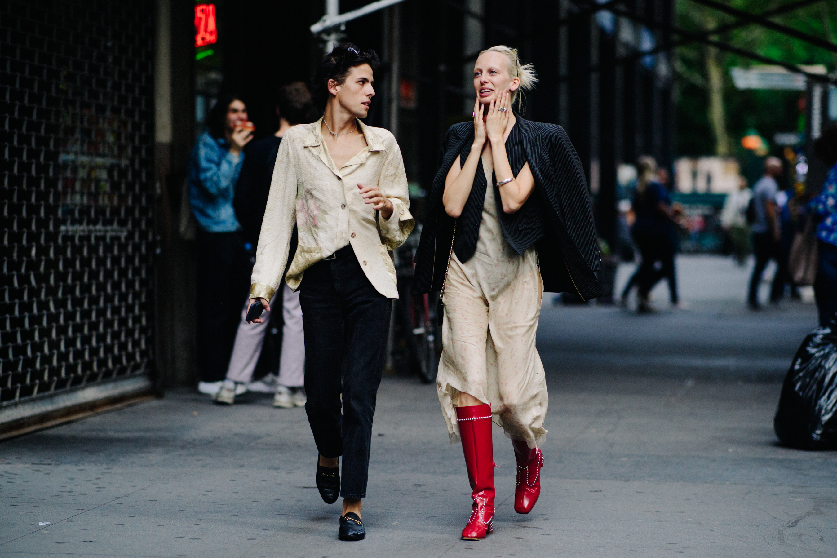 Model wearing tall red boots