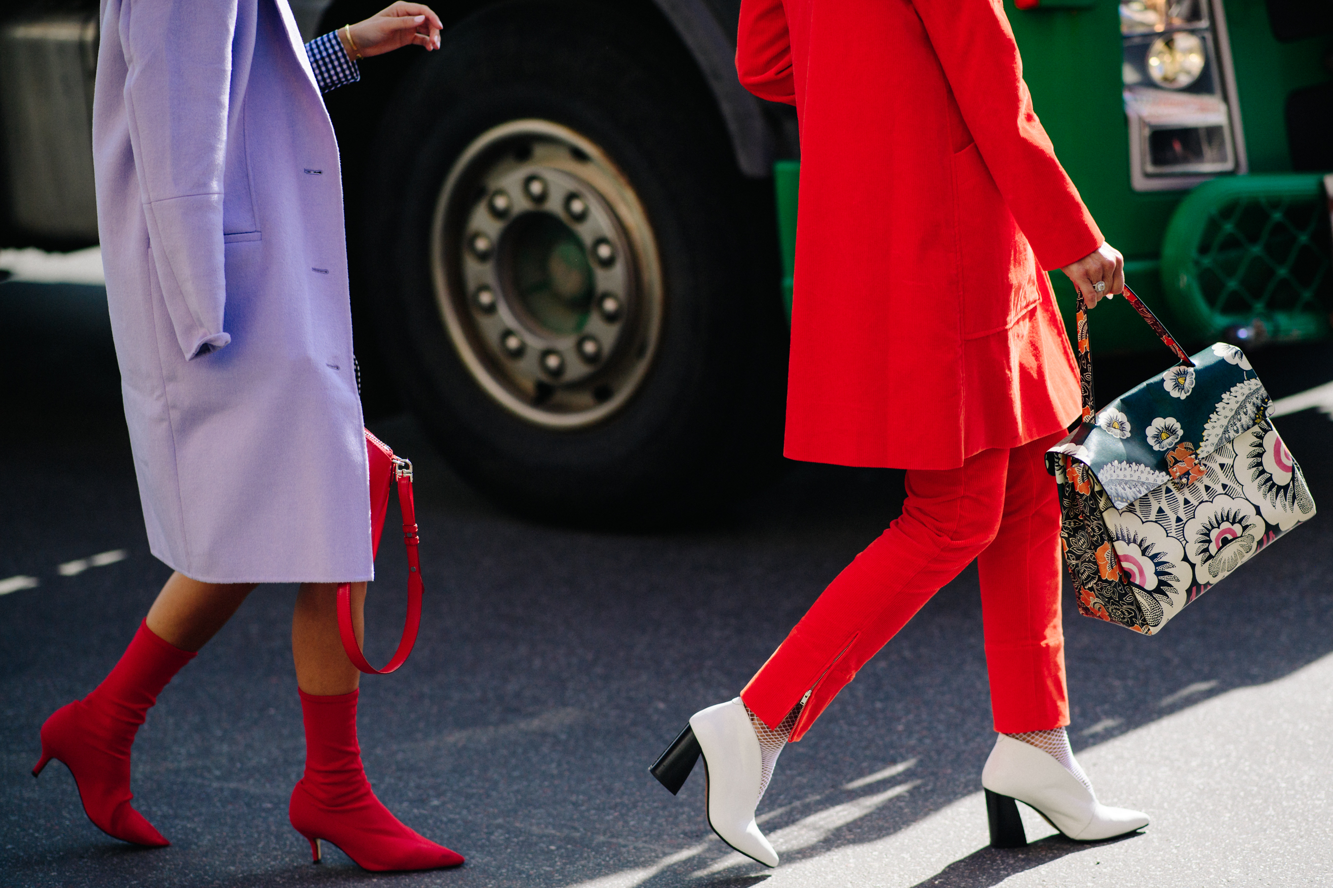 Two women wearing ankle boots