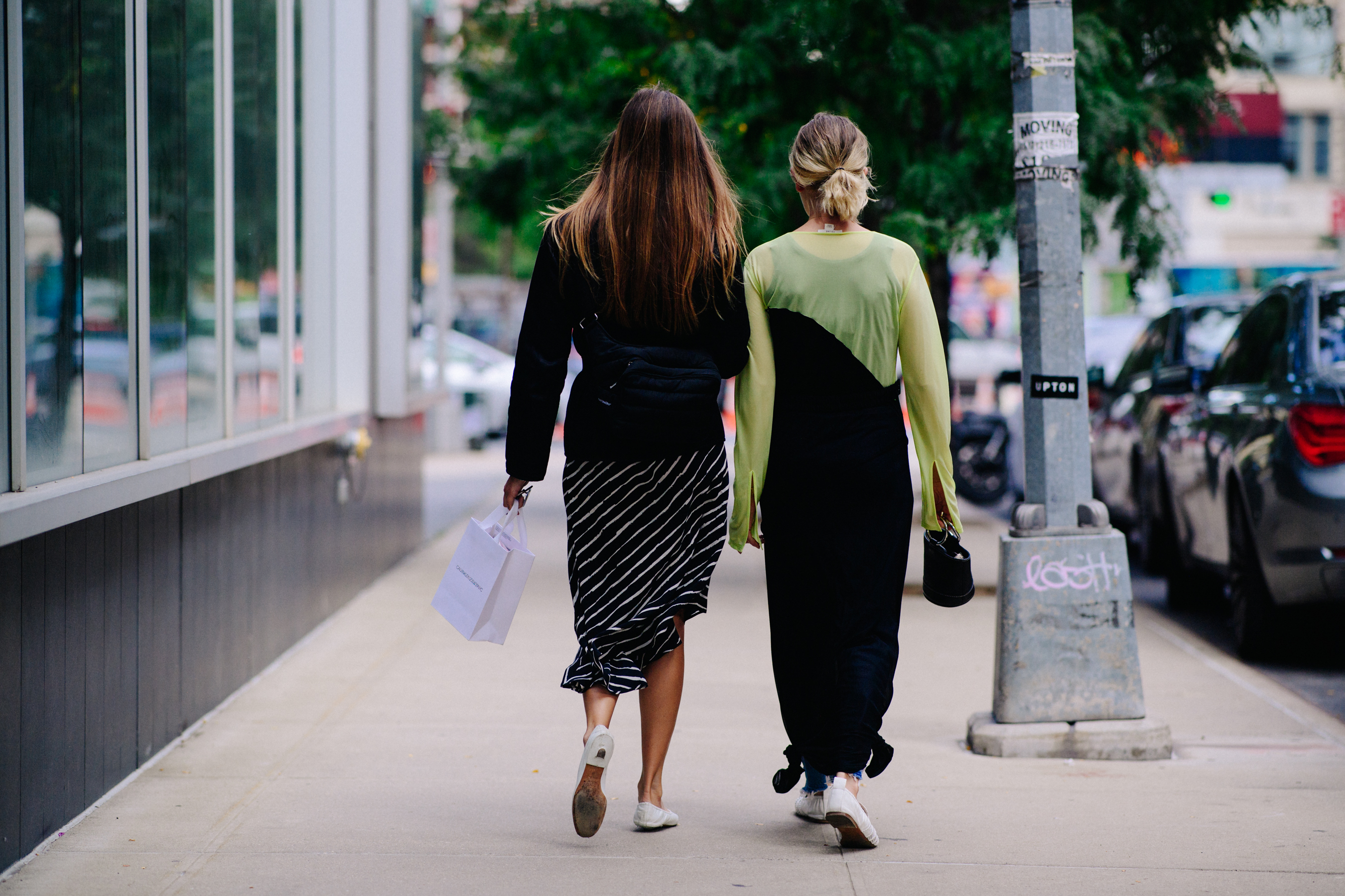 Two American editors wearing black