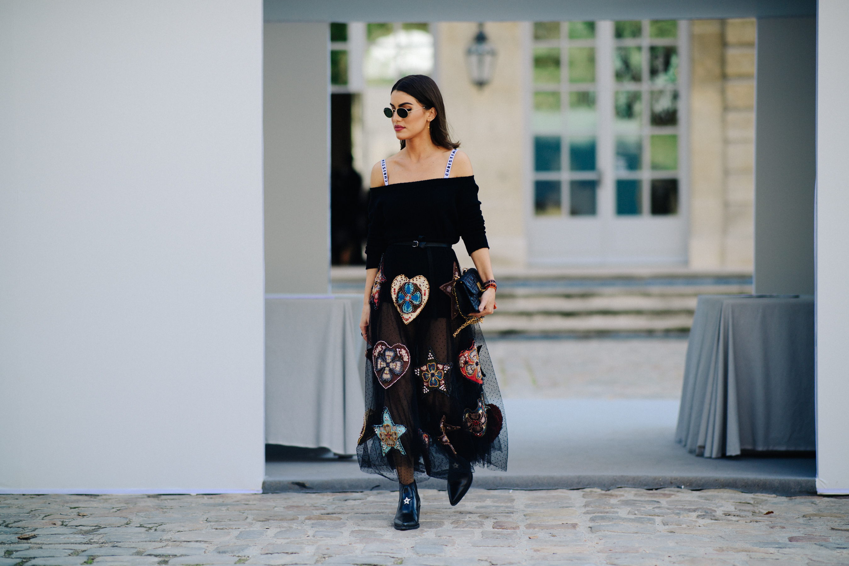 Woman wearing Christian Dior outfit