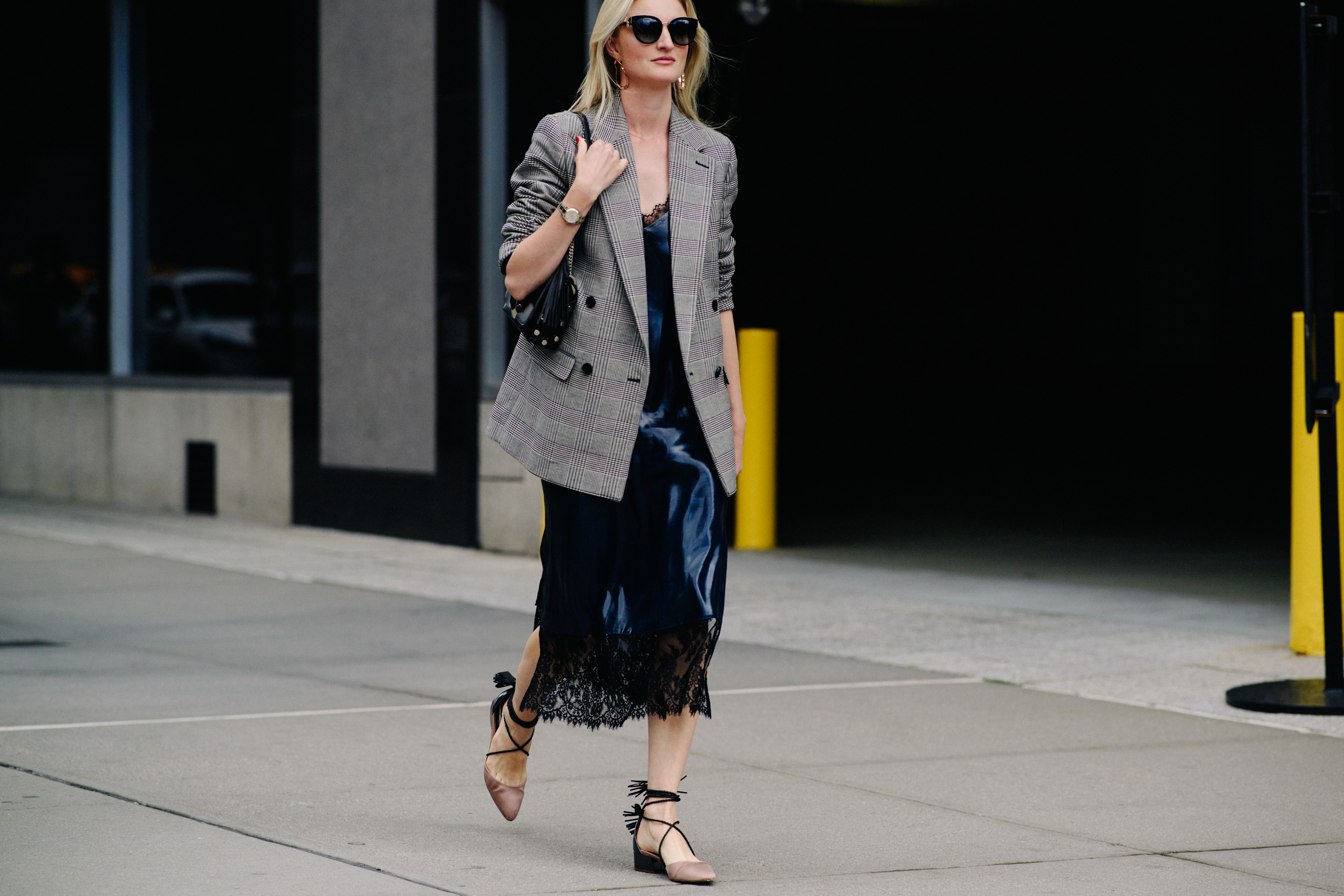 Woman wearing gray blazer