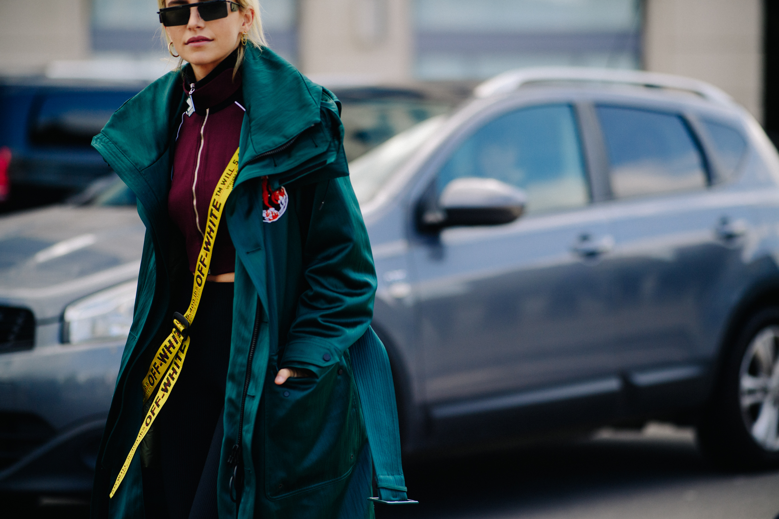 Blogger wearing green silk coat