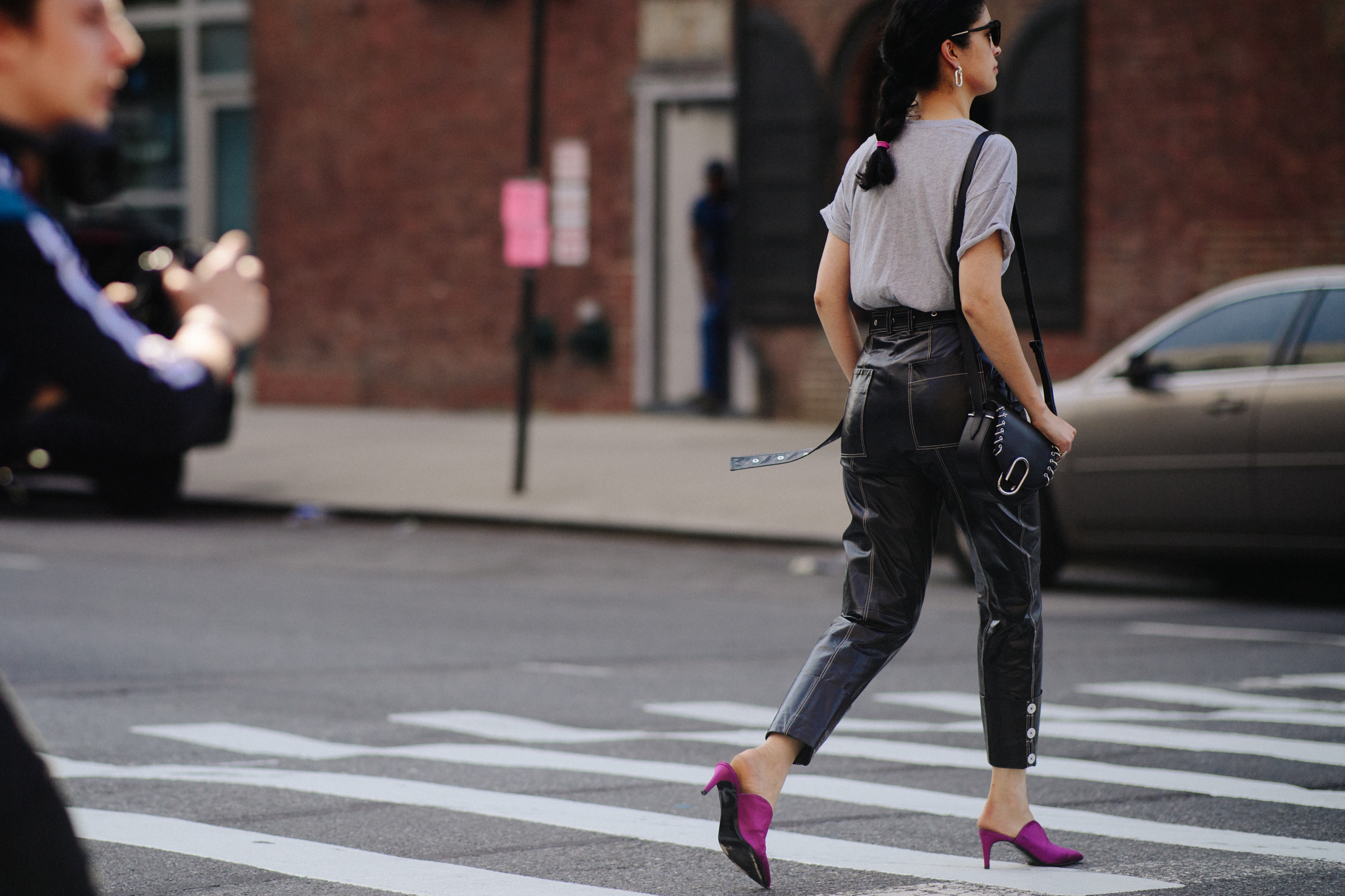 Woman wearing black leather pants