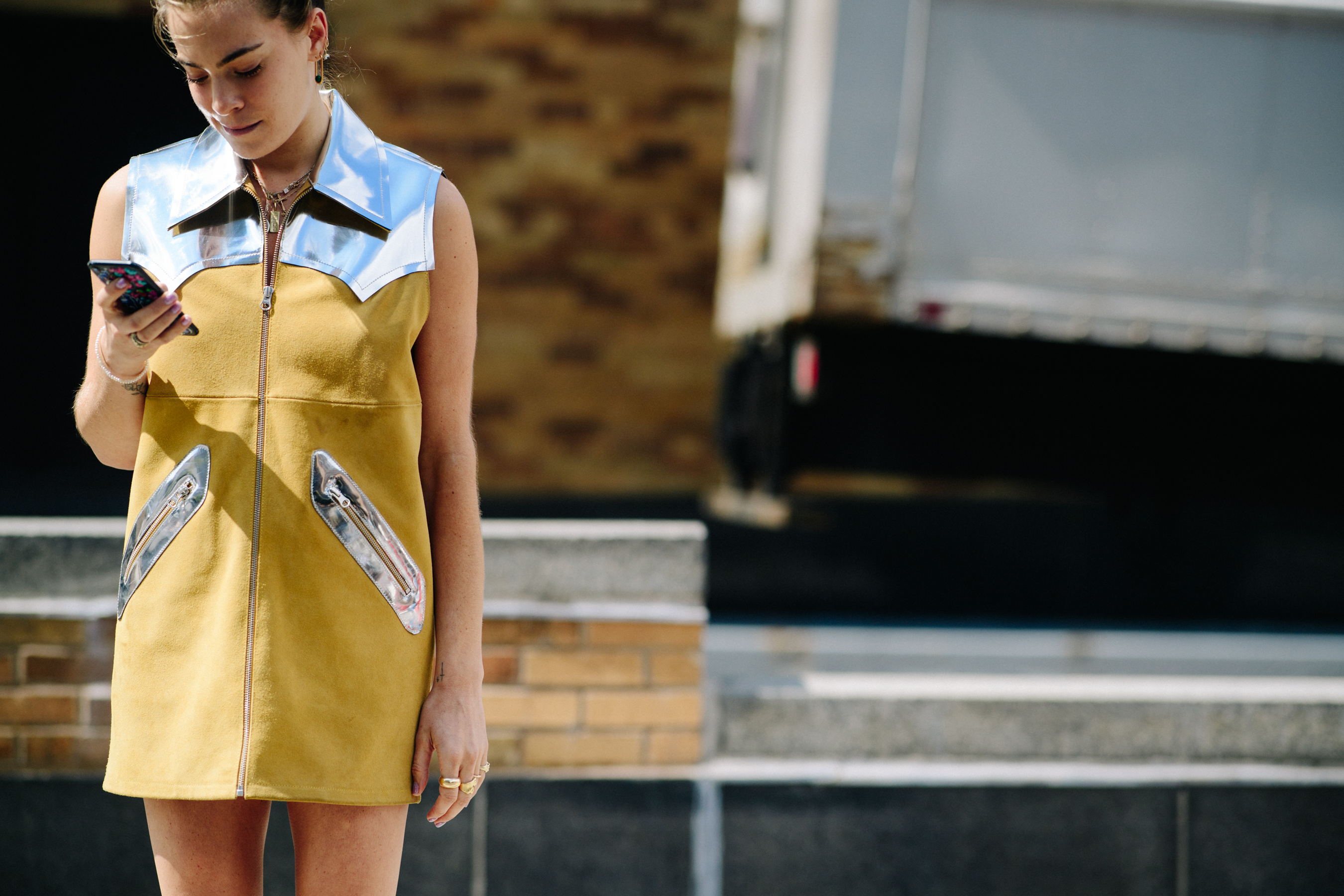 Woman wearing yellow suede dress