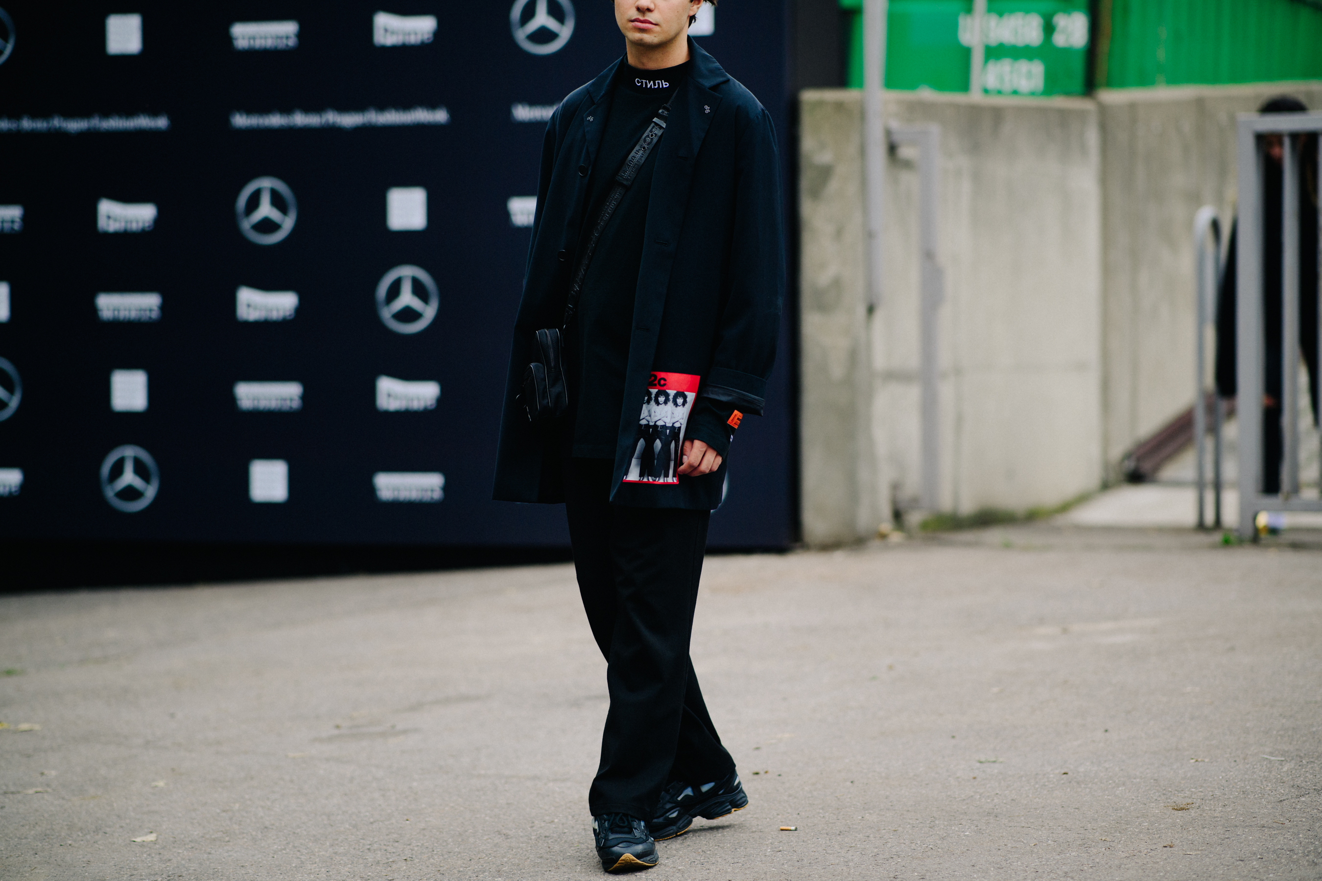Man wearing Heron Preston longsleeve
