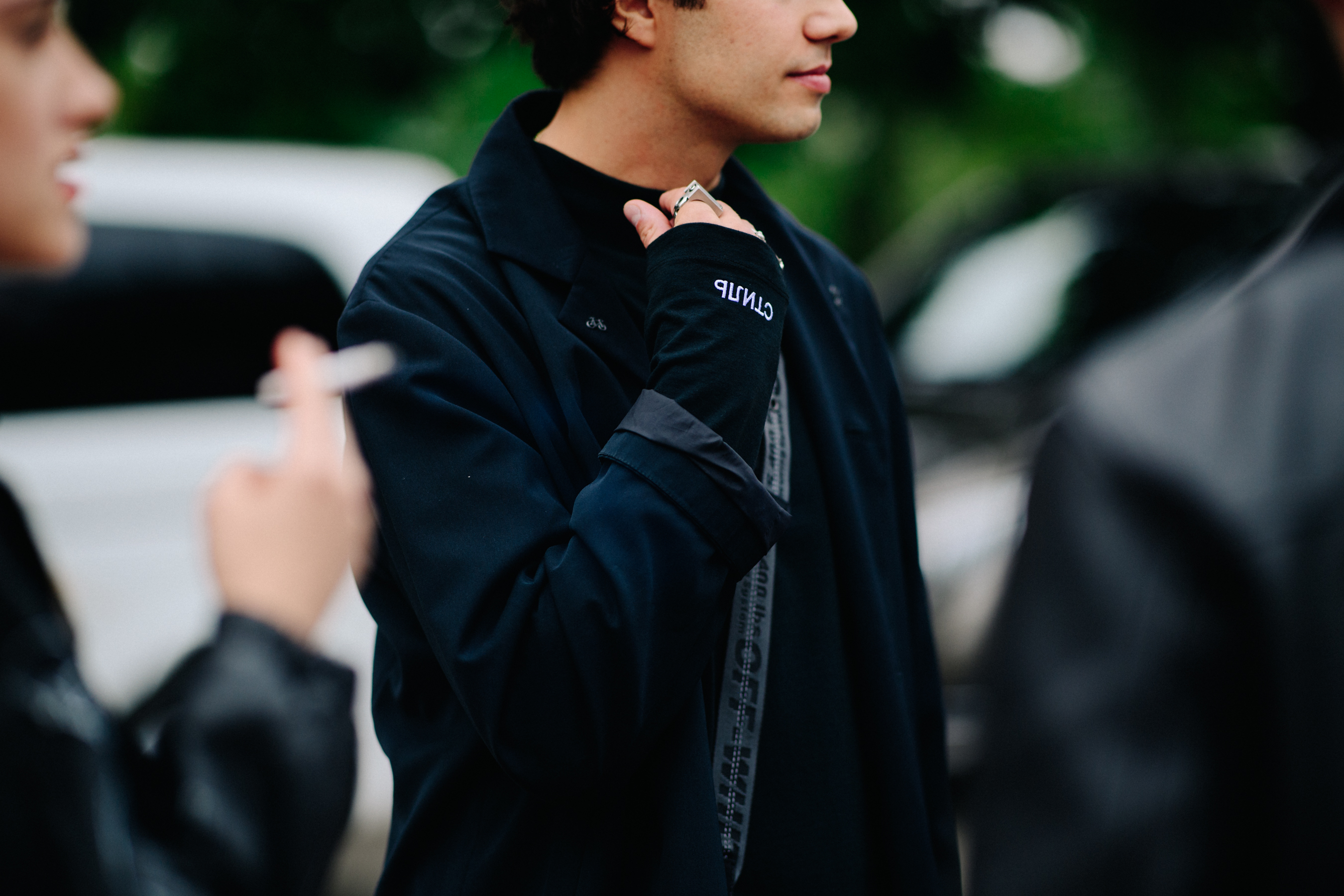 Man wearing Heron Preston longsleeve