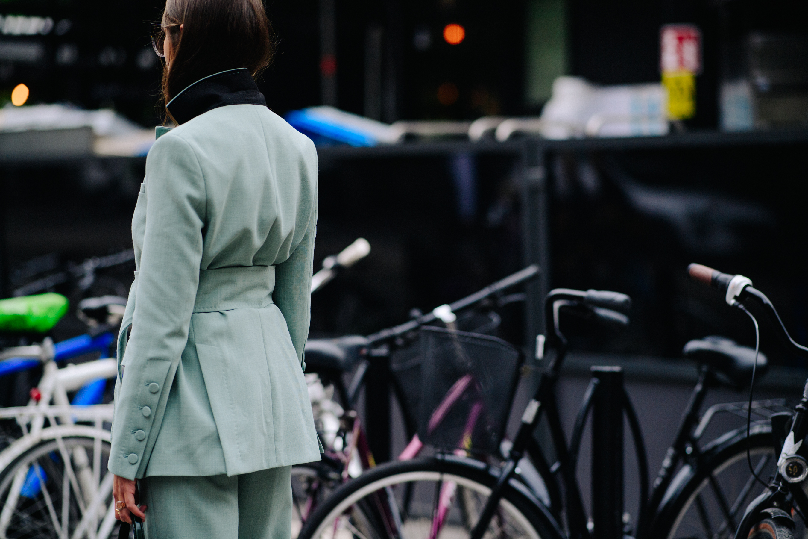 Blogger wearing blue green suit