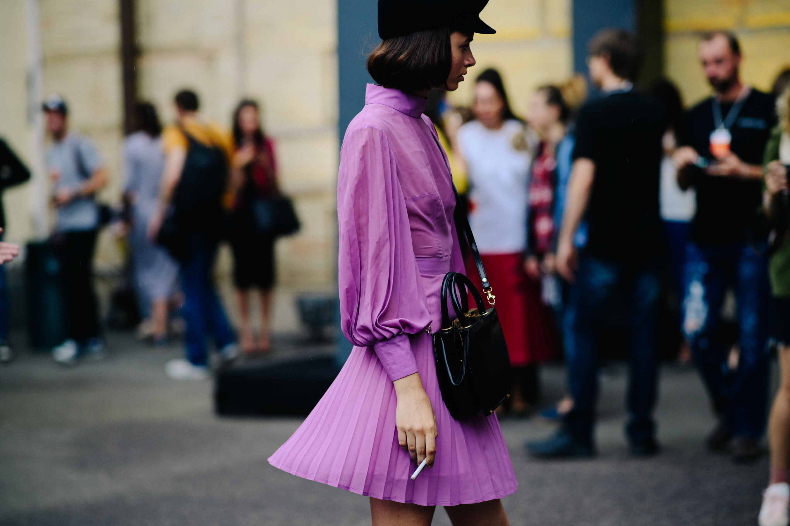 Model wearing fuscia colour dress