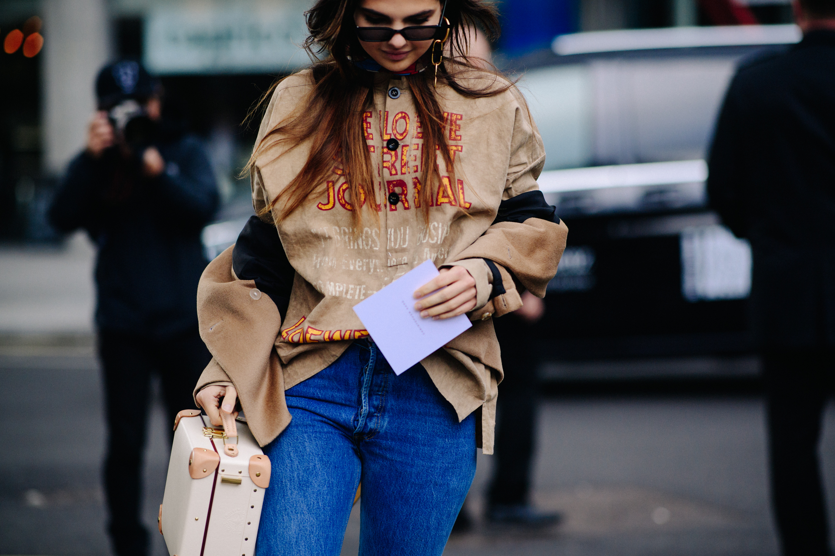 Woman wearing shirt with typeface