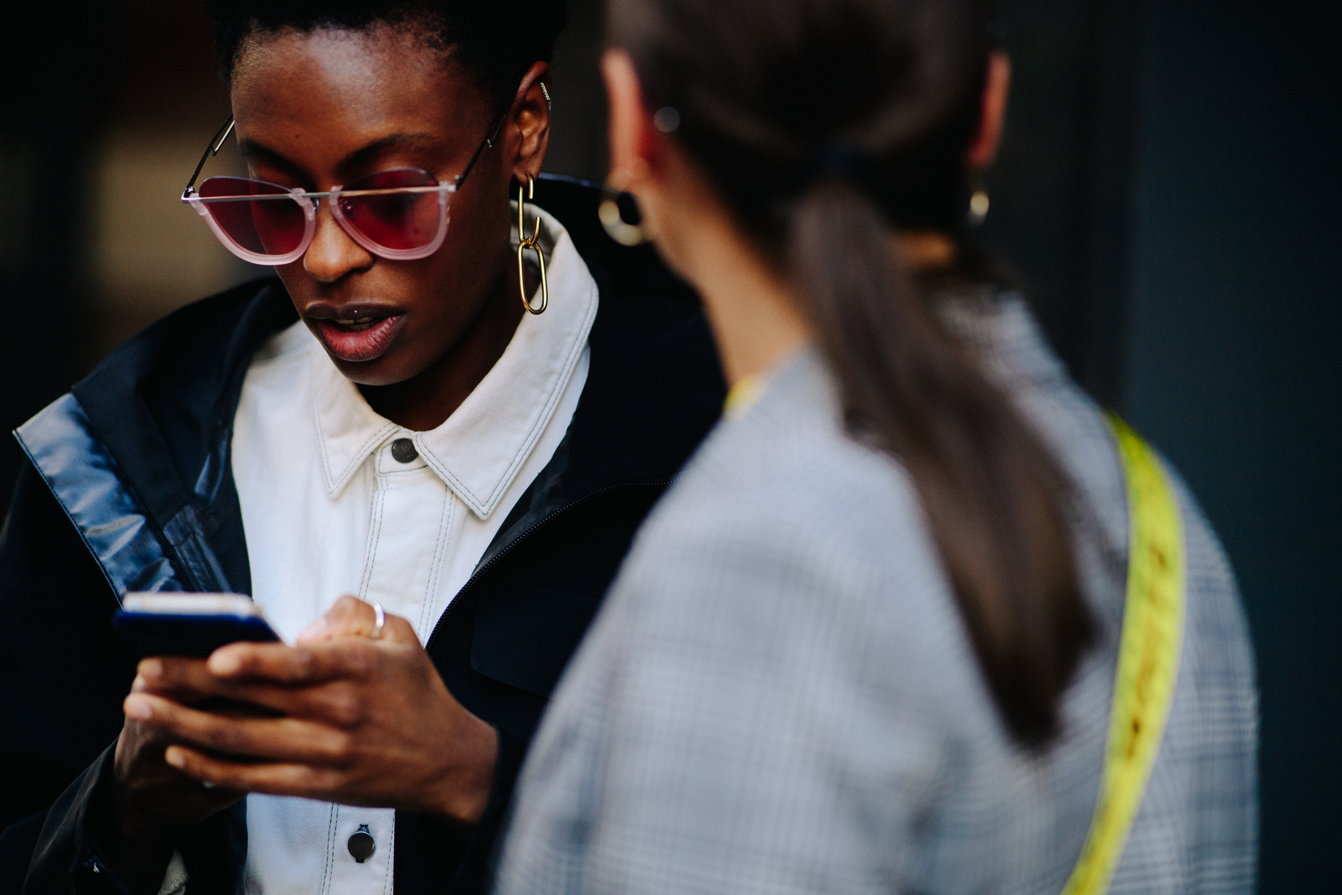 Two women wearing Off-White after a show