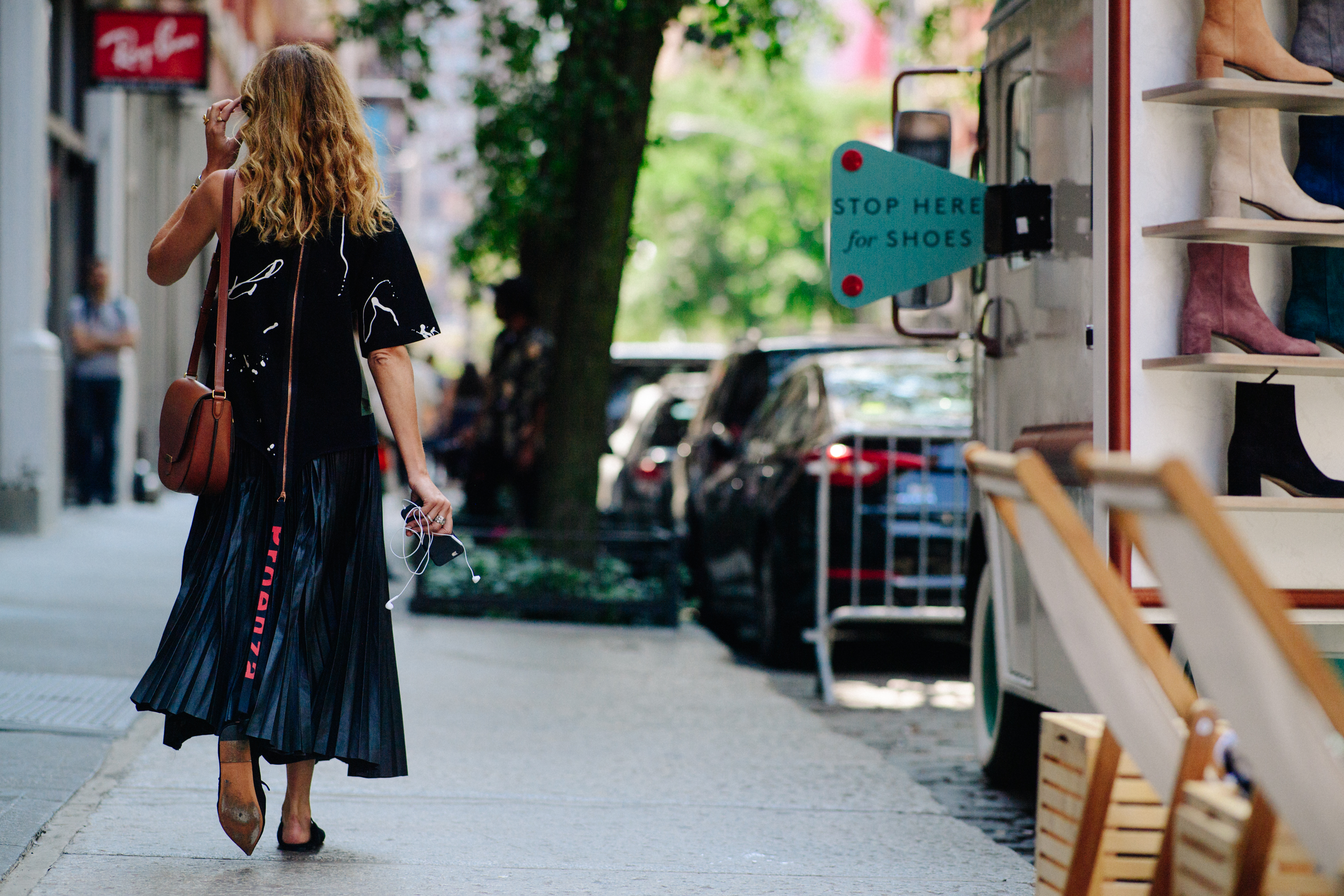 Stylist wearing long black dress