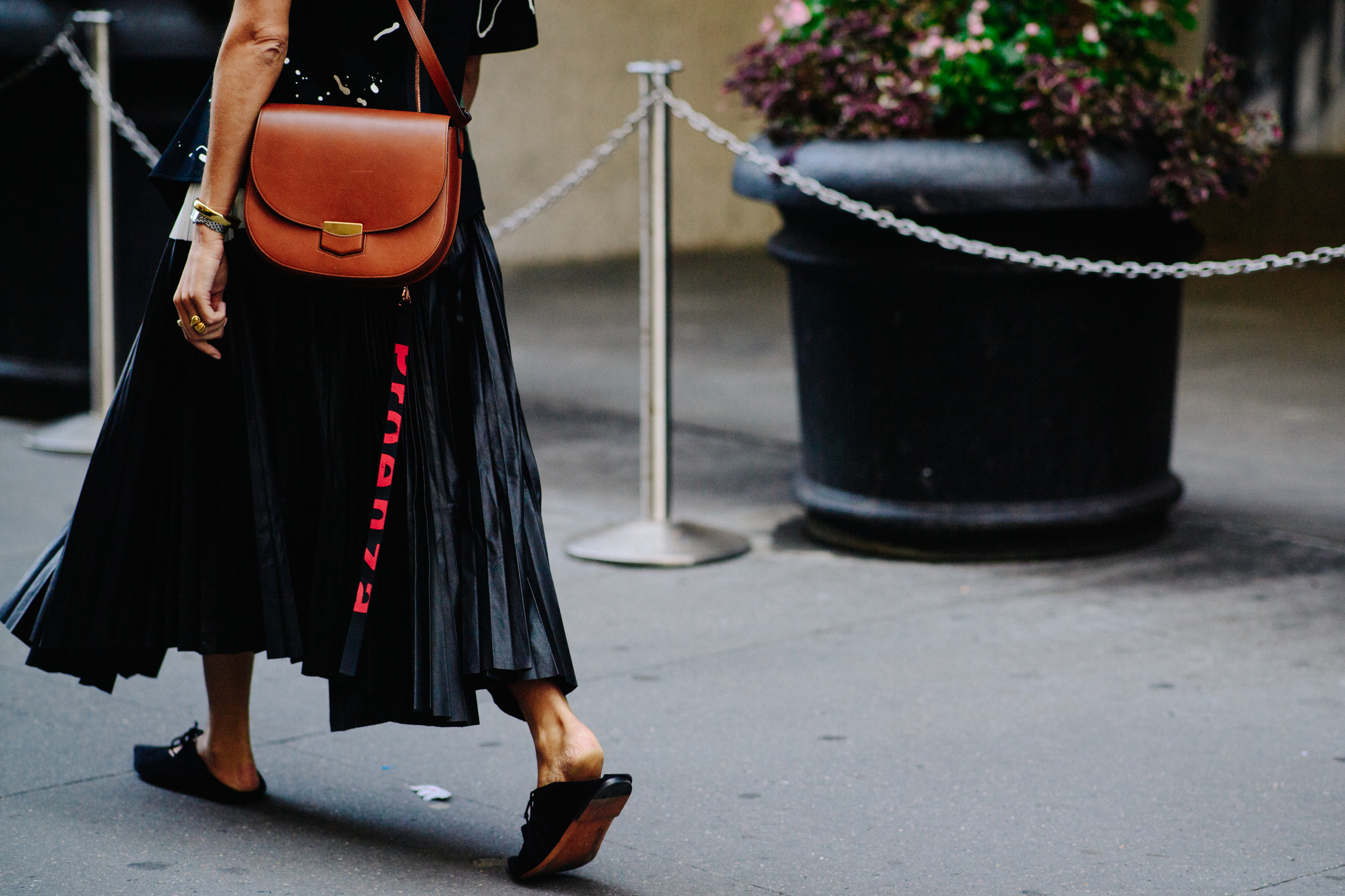Turkish stylist wearing long black dress