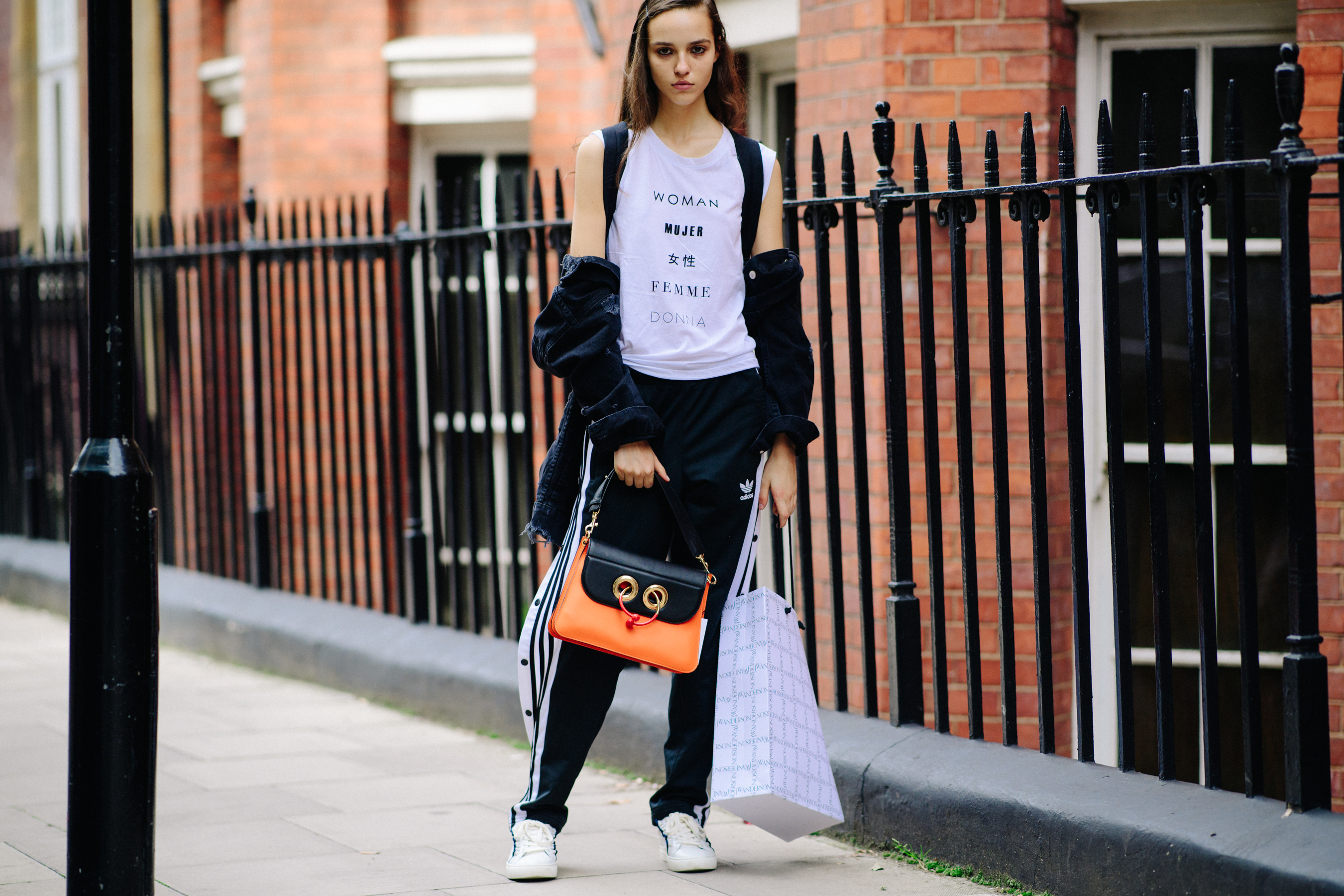 Model with J.W.Anderson handbag after a show
