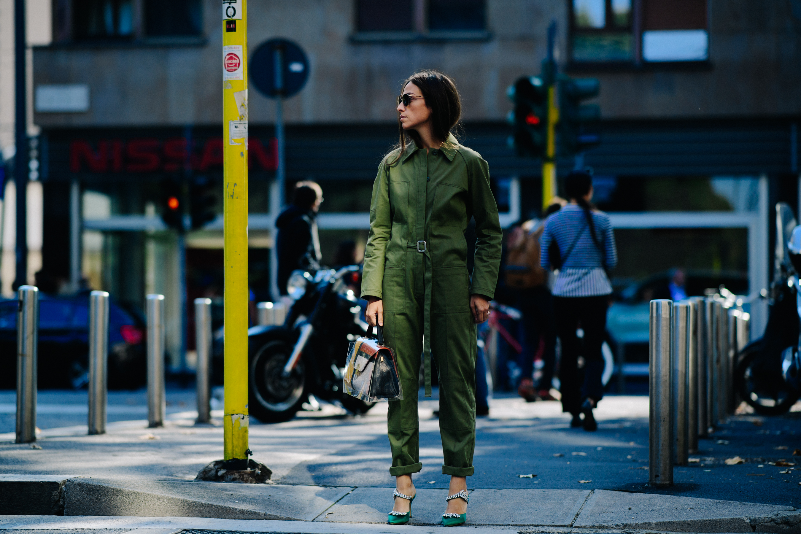 Woman wearing green jumpsuit