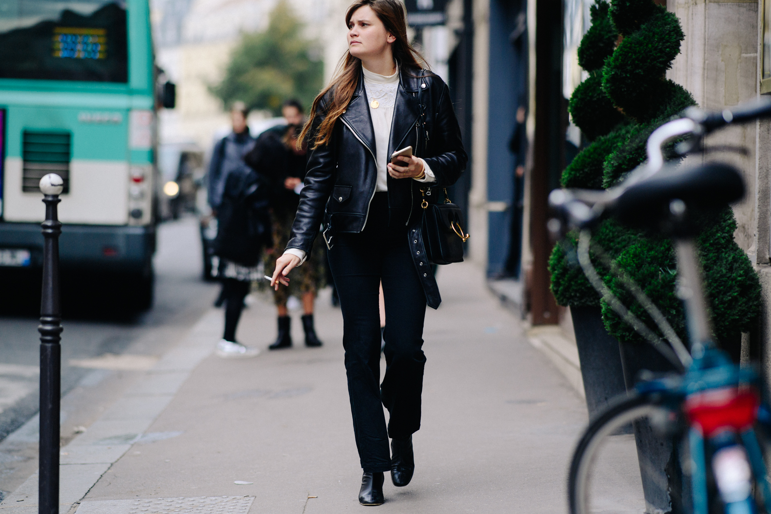 Woman wearing black leather jacket
