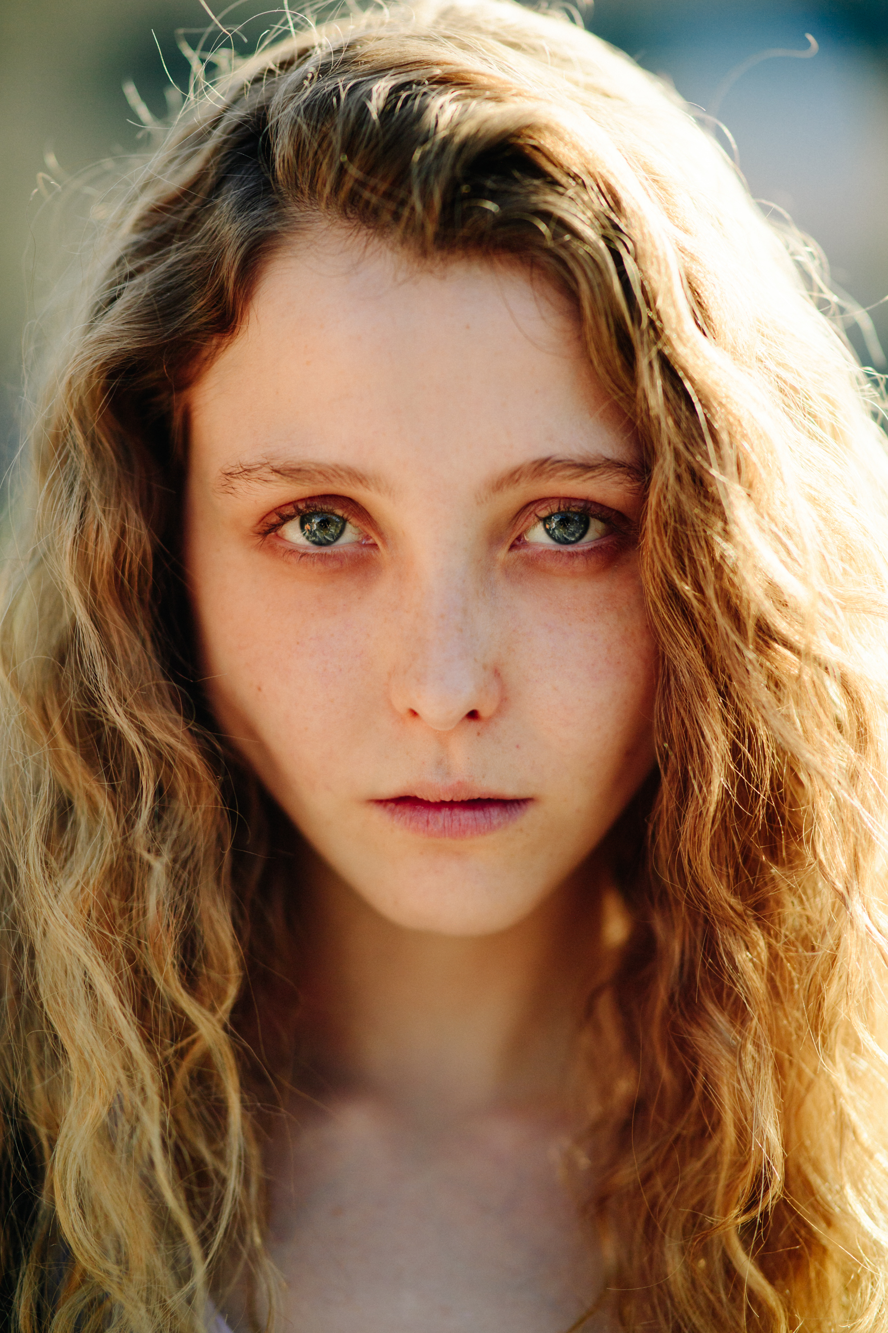 Portrait of model with blonde hair and green eyes