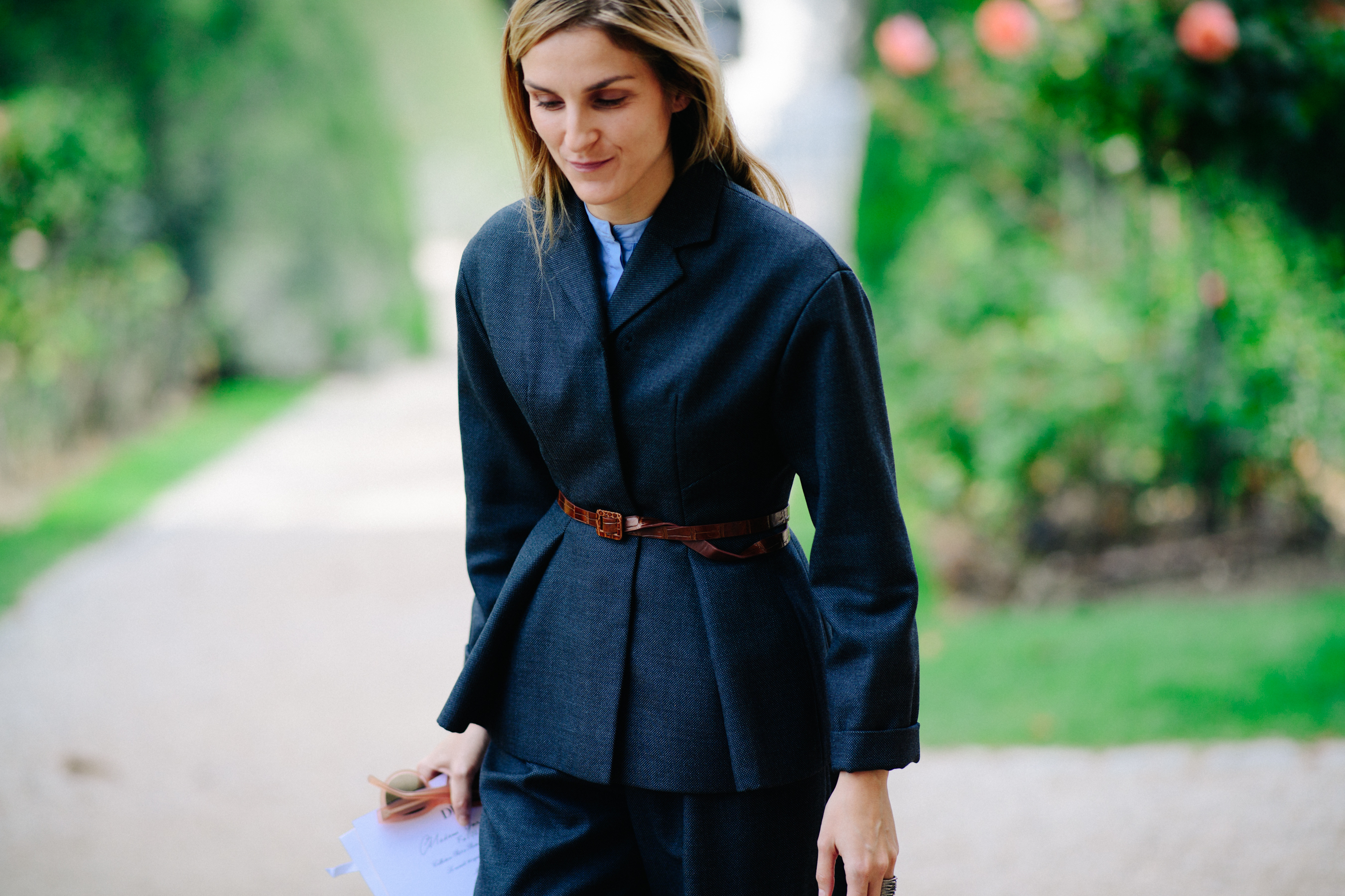 Jewellery designer wearing gray suit