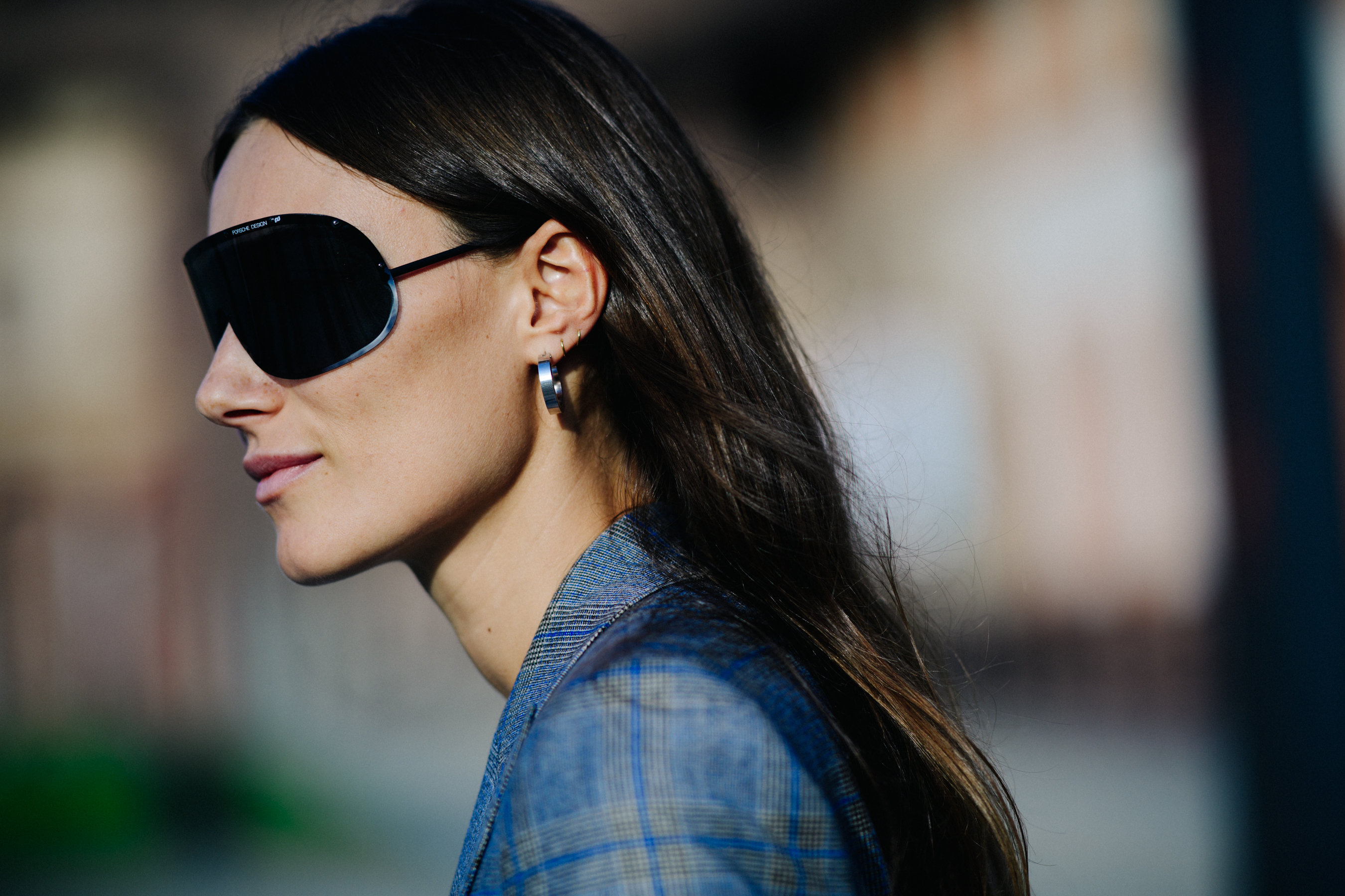 Closeup of Italian woman wearing large sunglasses