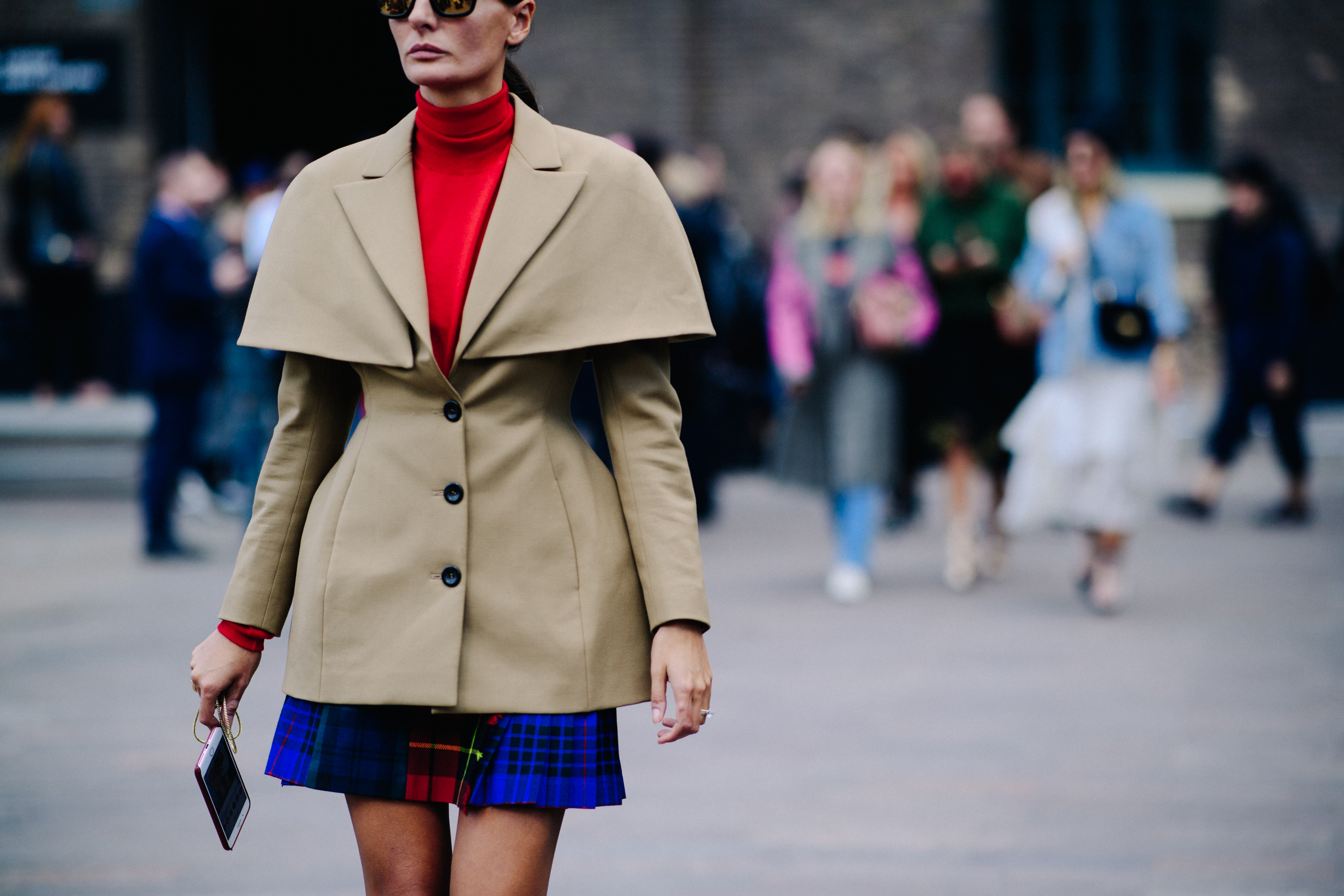 Italian stylist earing beige coat