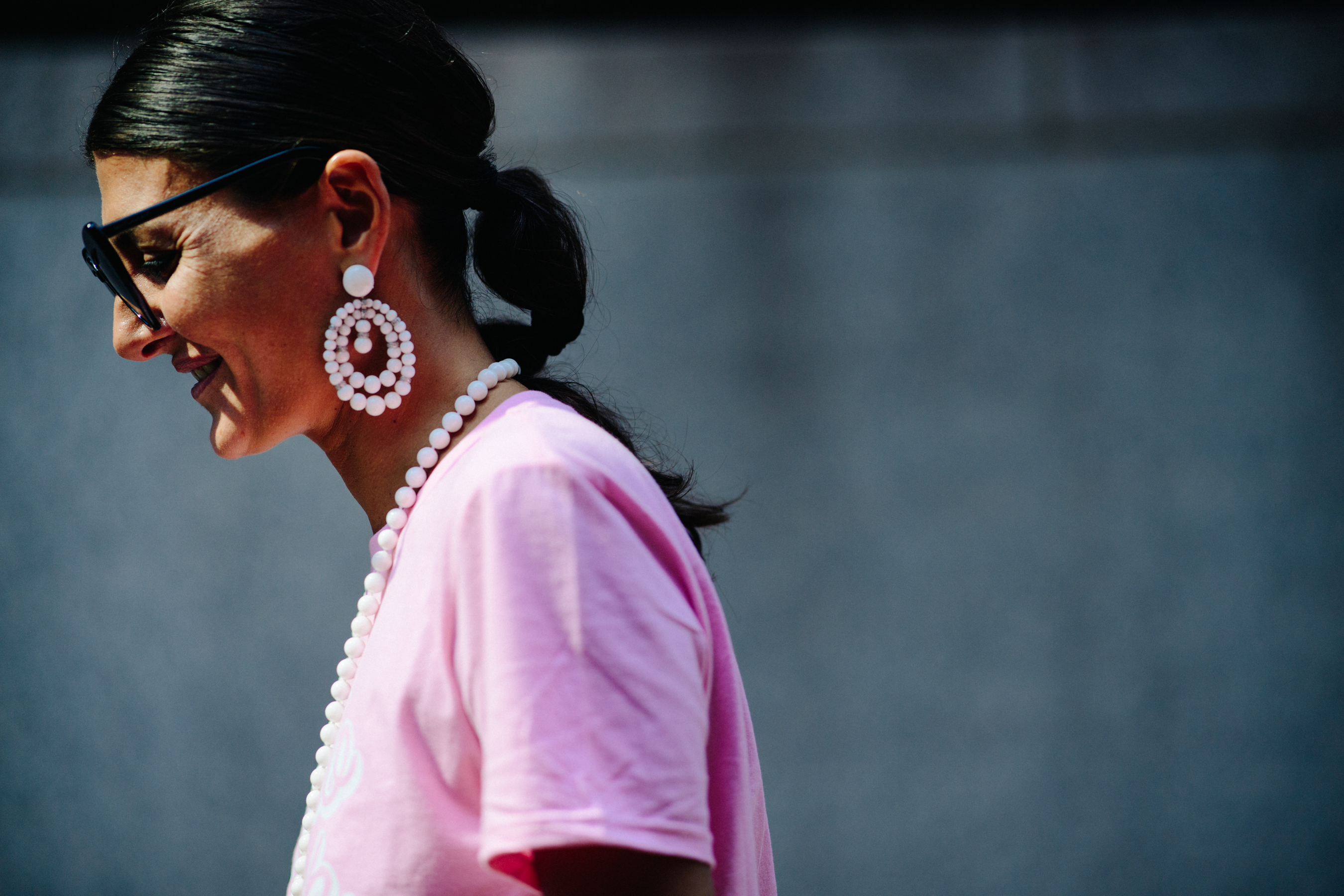 Italian stylist wearing pink top