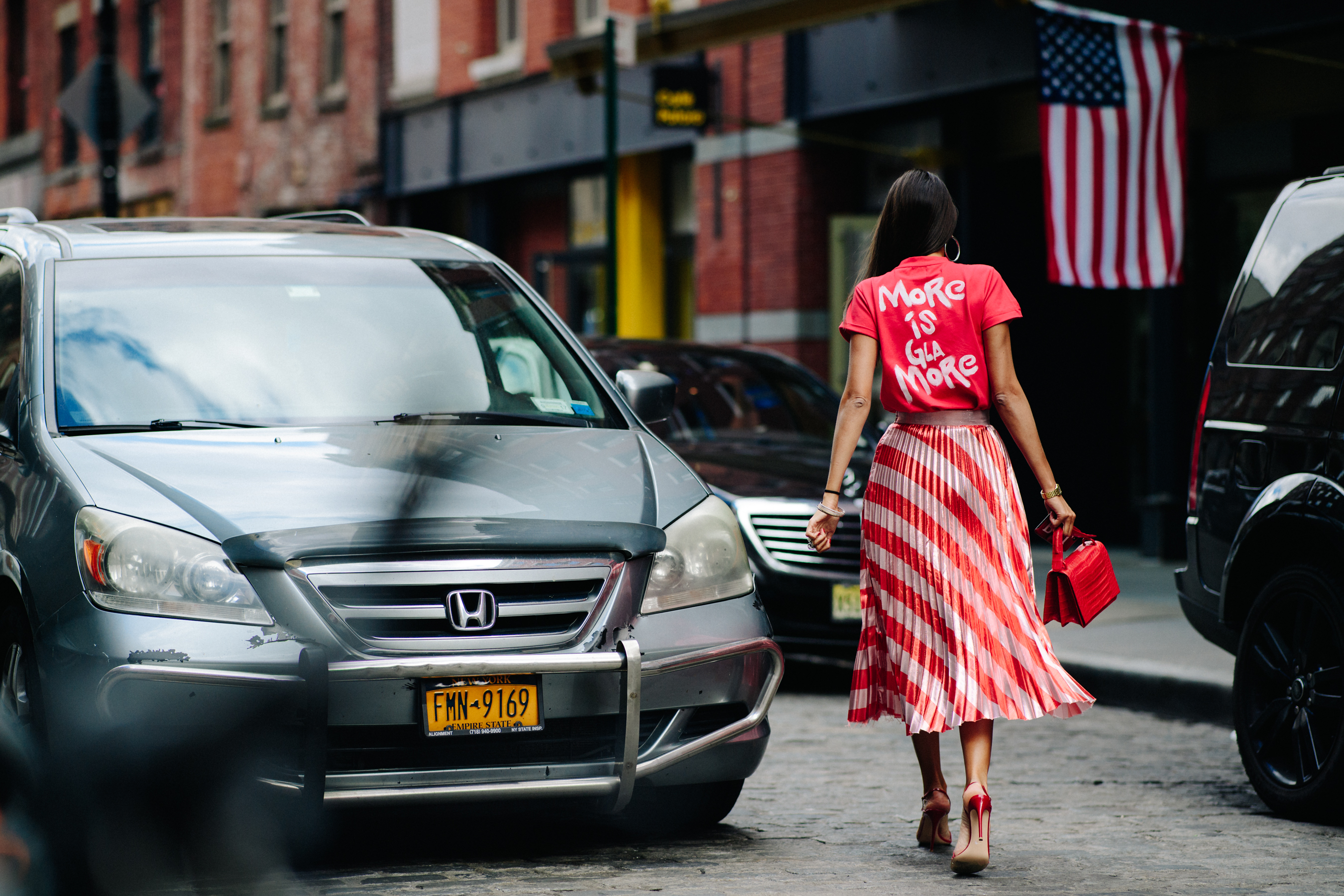 Italian stylist wearing stripy skirt