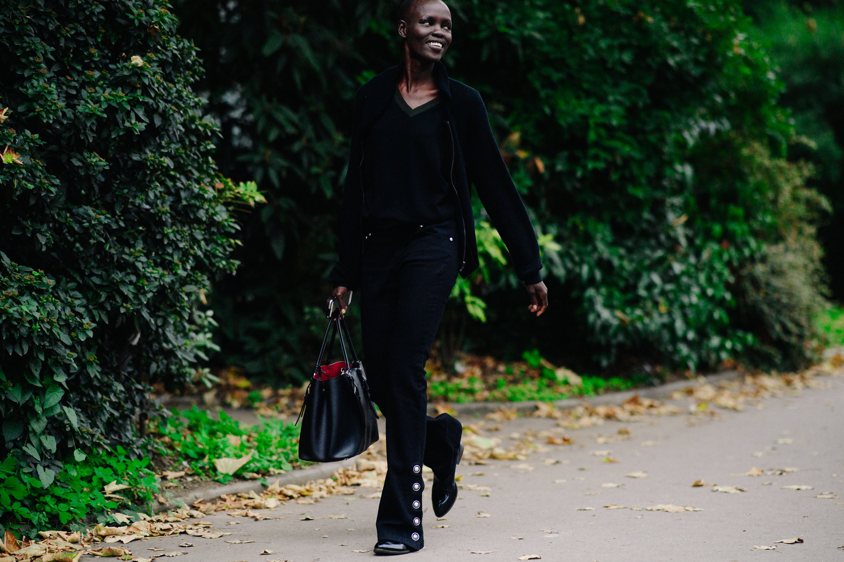 Model wearing black after a show