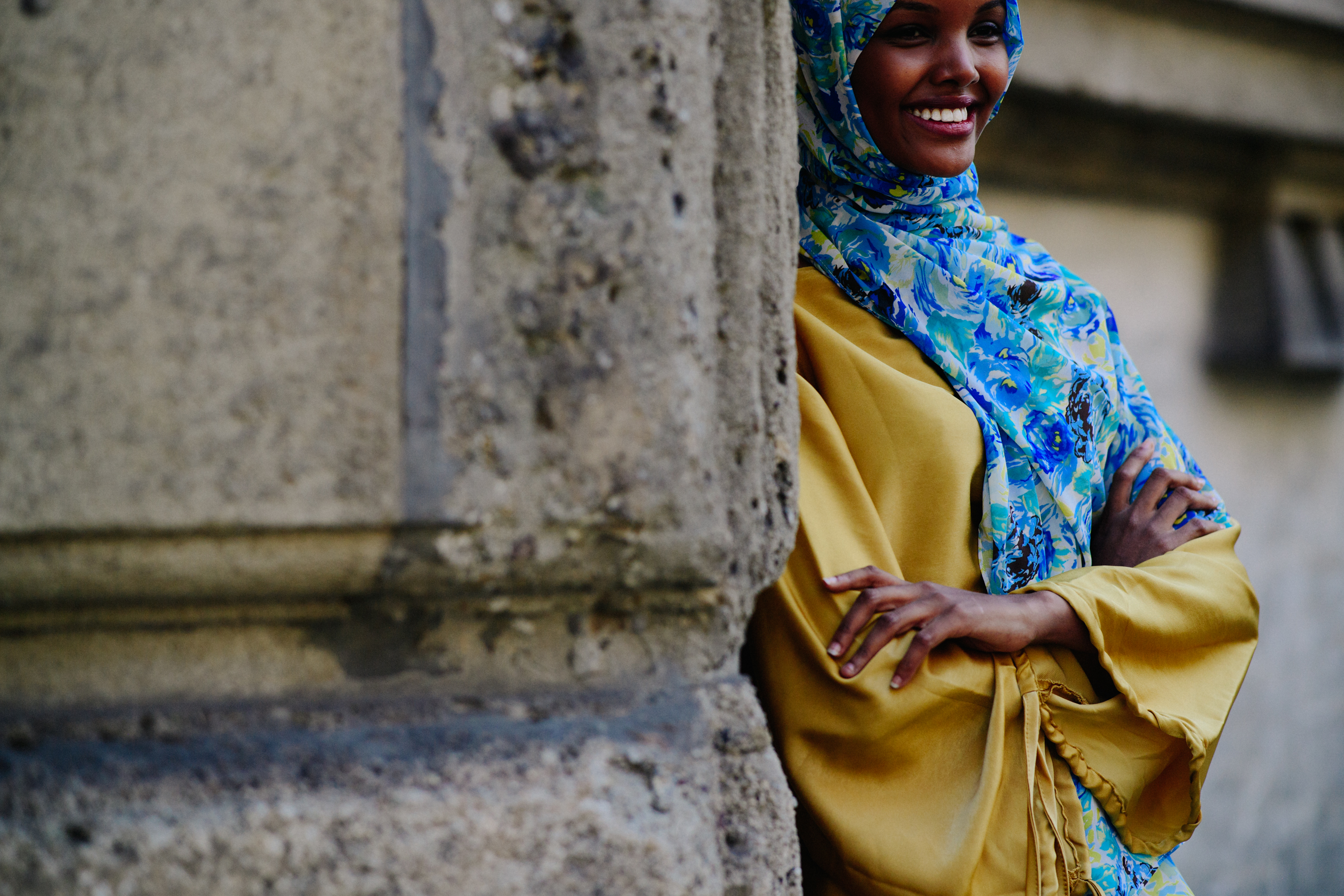 Model wearing blue headscarf
