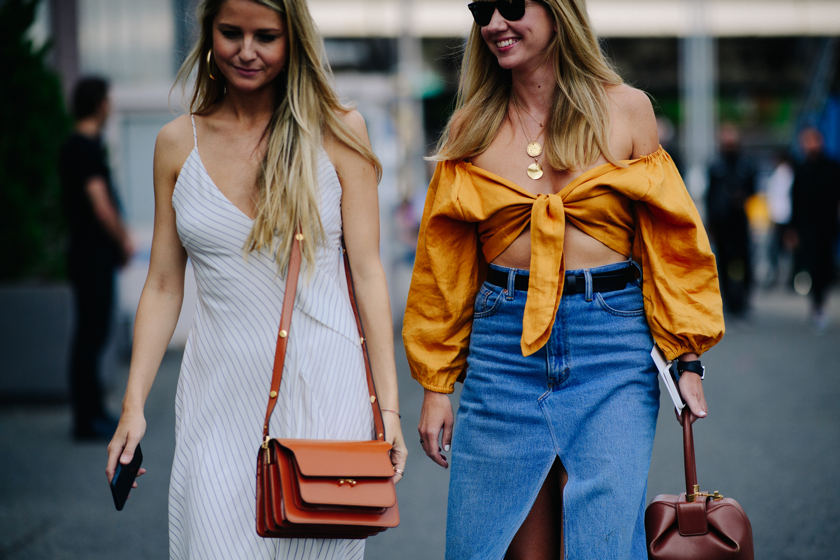 Two women wearing summer clothes