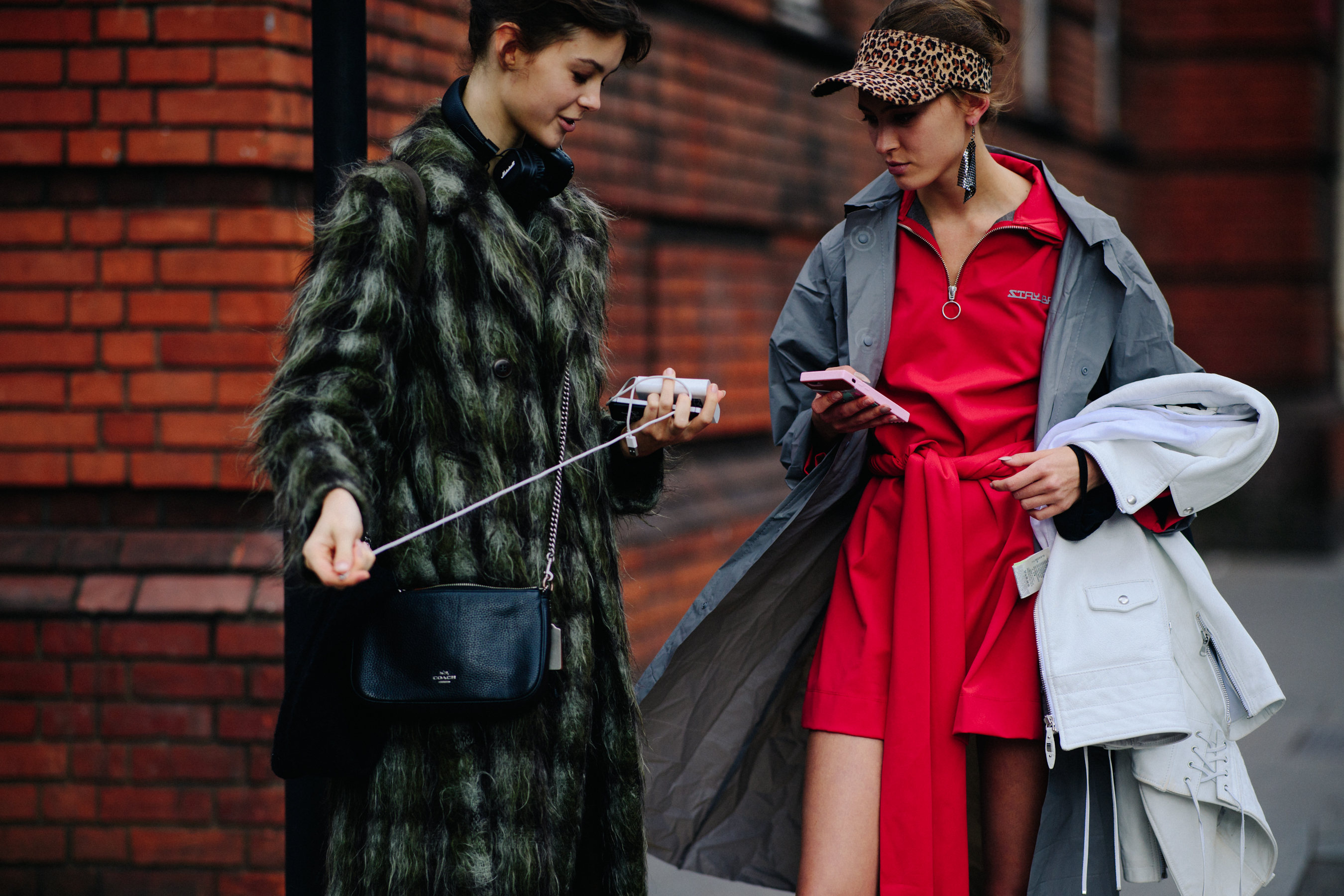 Two Russian models wearing coats