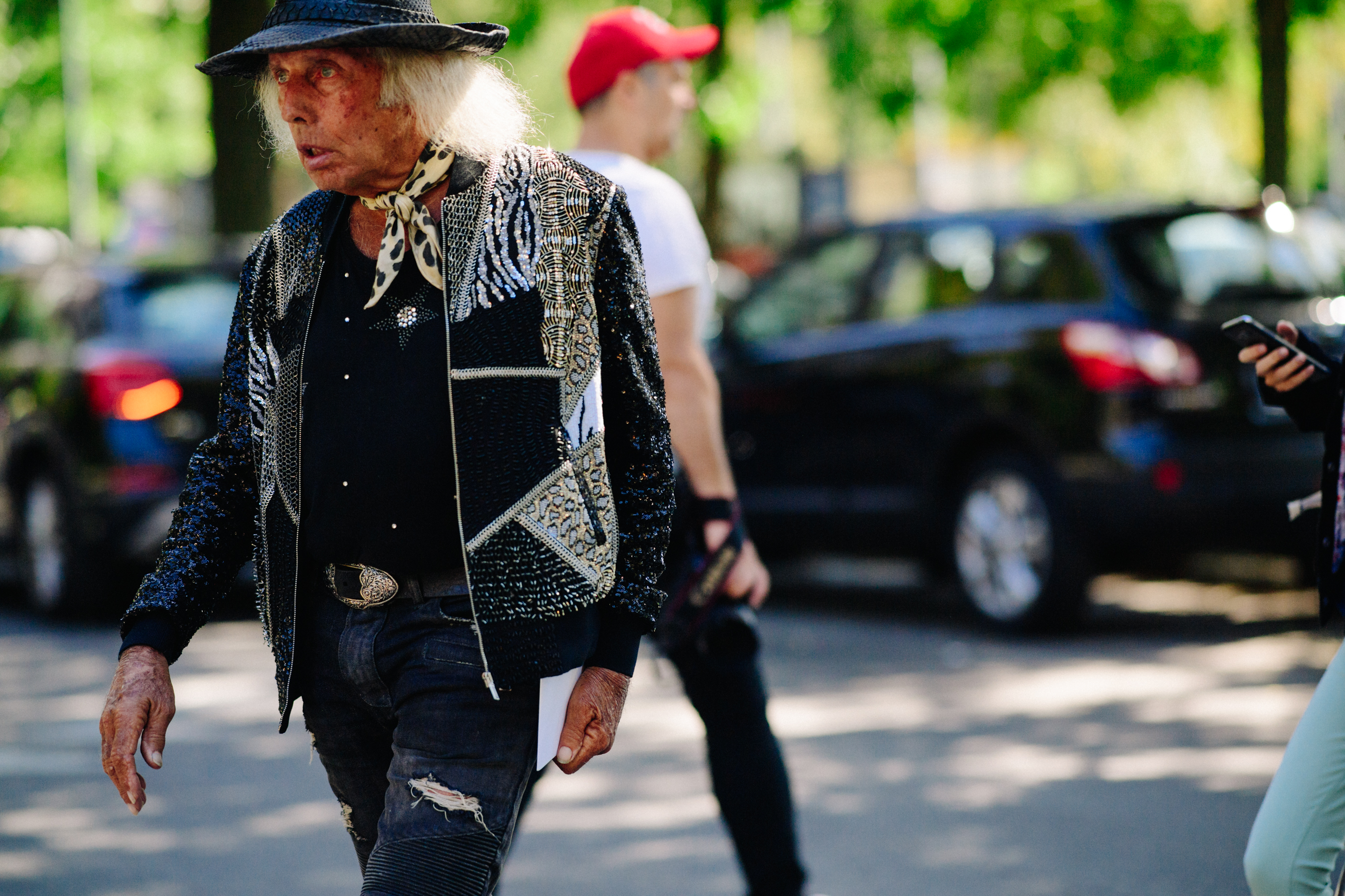 Man wearing sequin bomber jacket