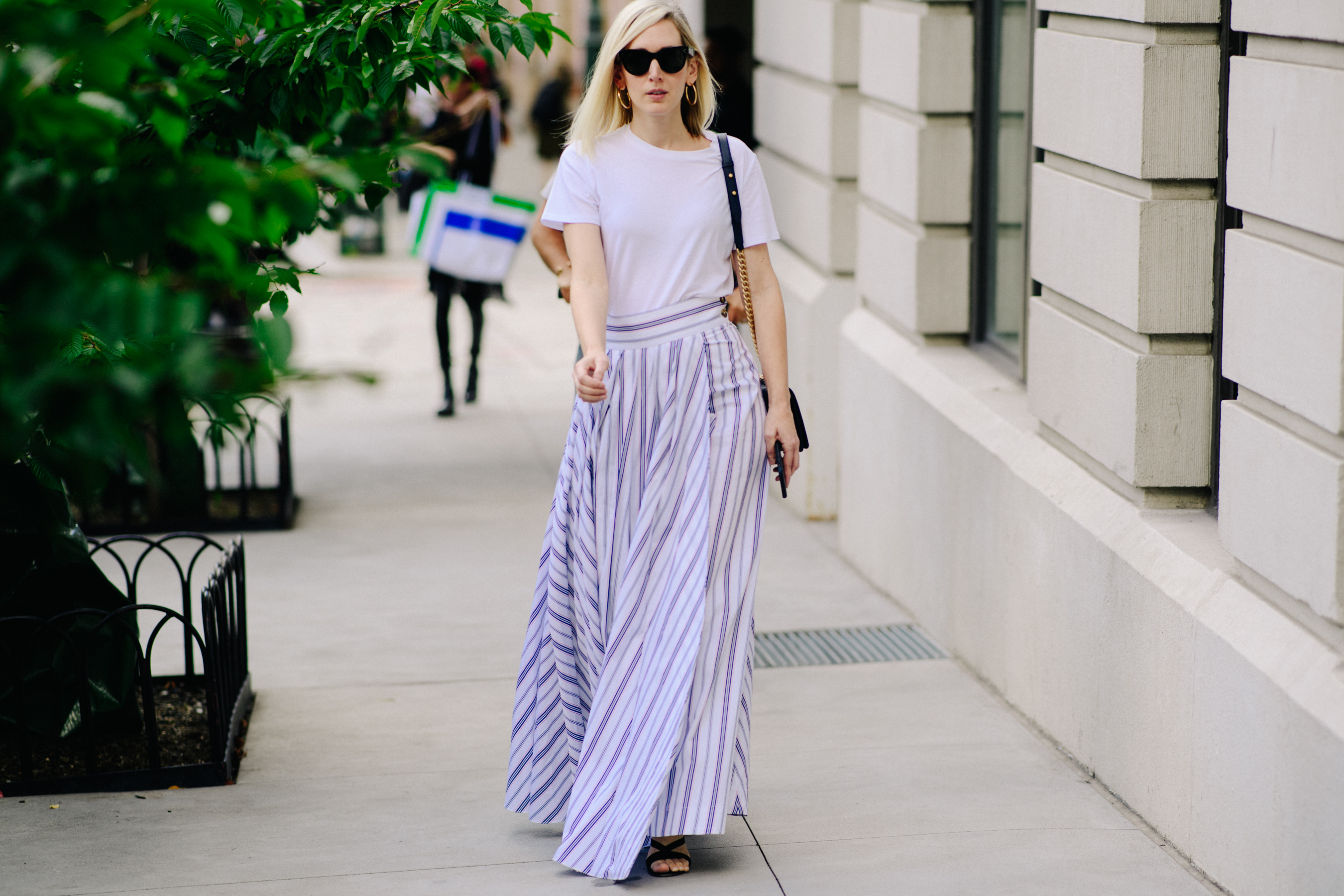 Woman wearing long stripy skirt