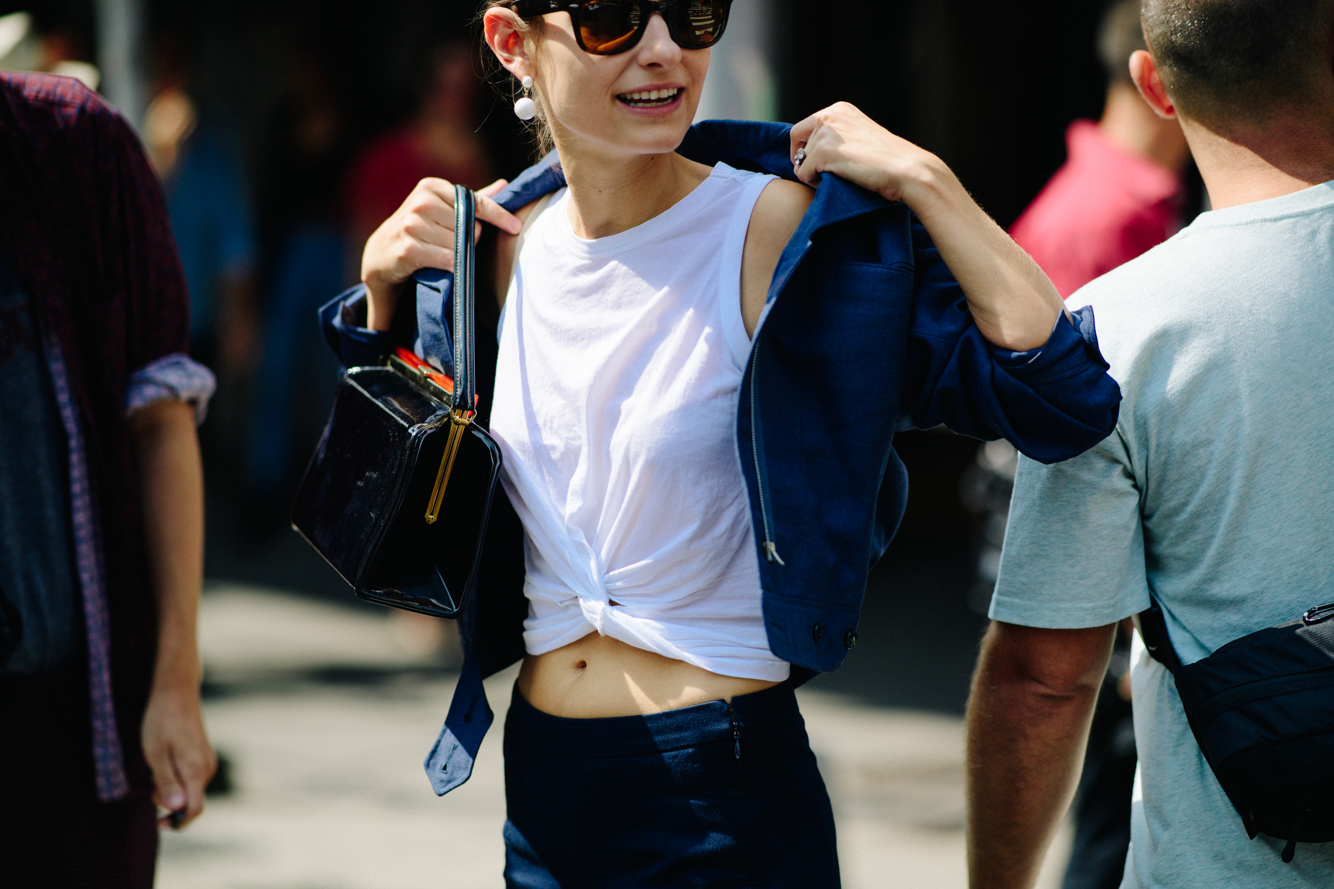 American illustrator wearing white top