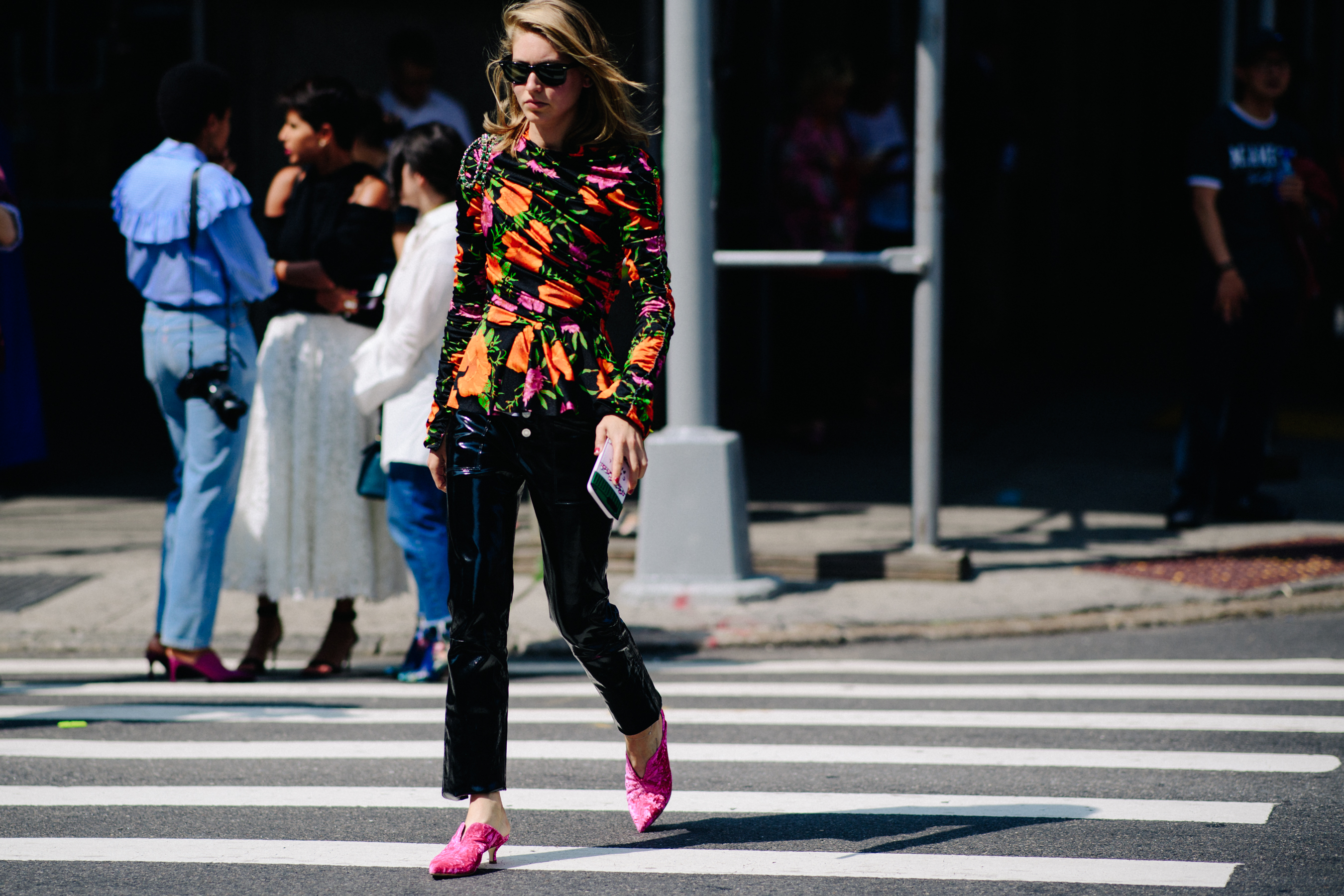 American woman wearing Balenciaga top