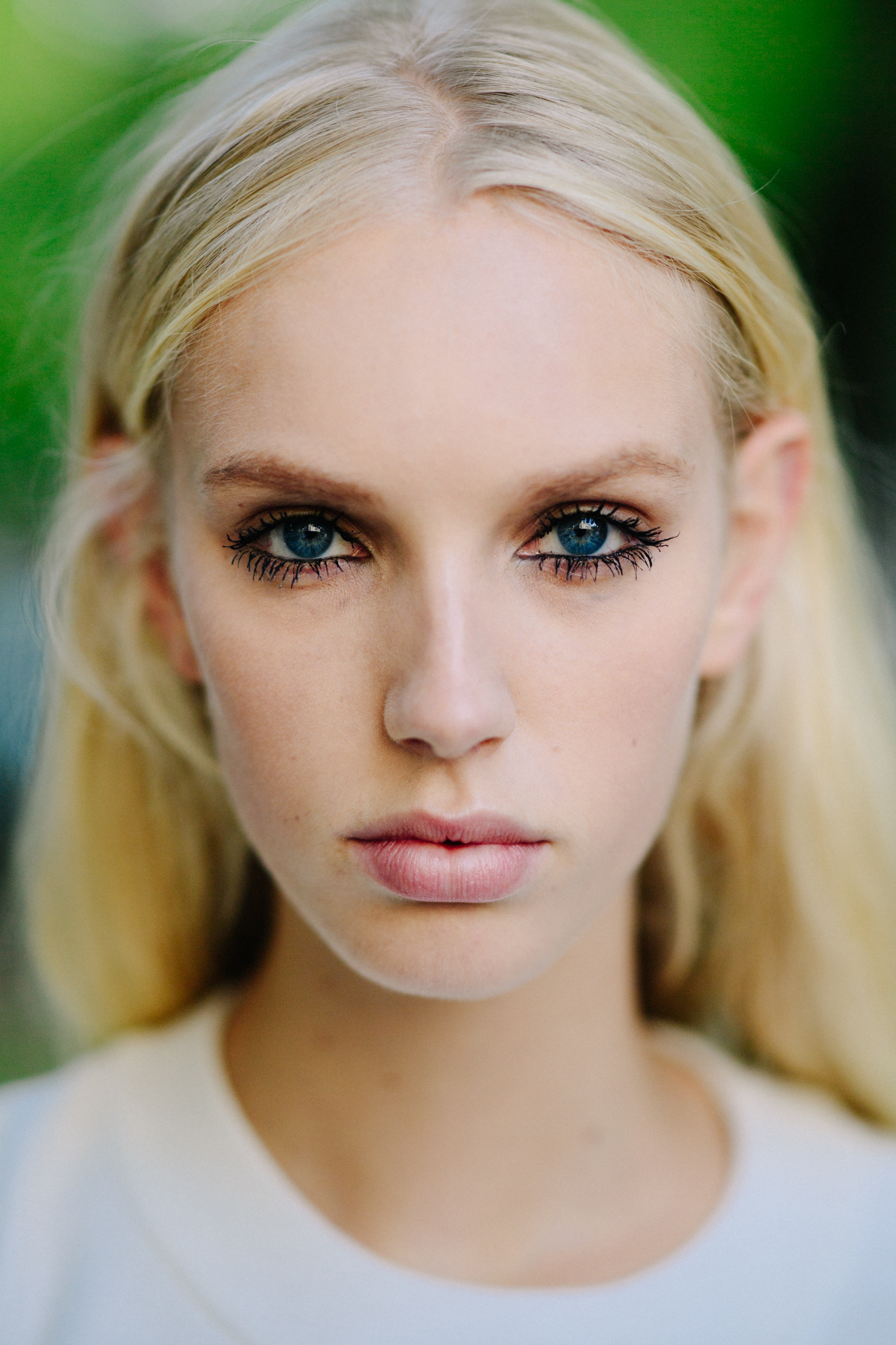 Portrait of a blonde model after a show