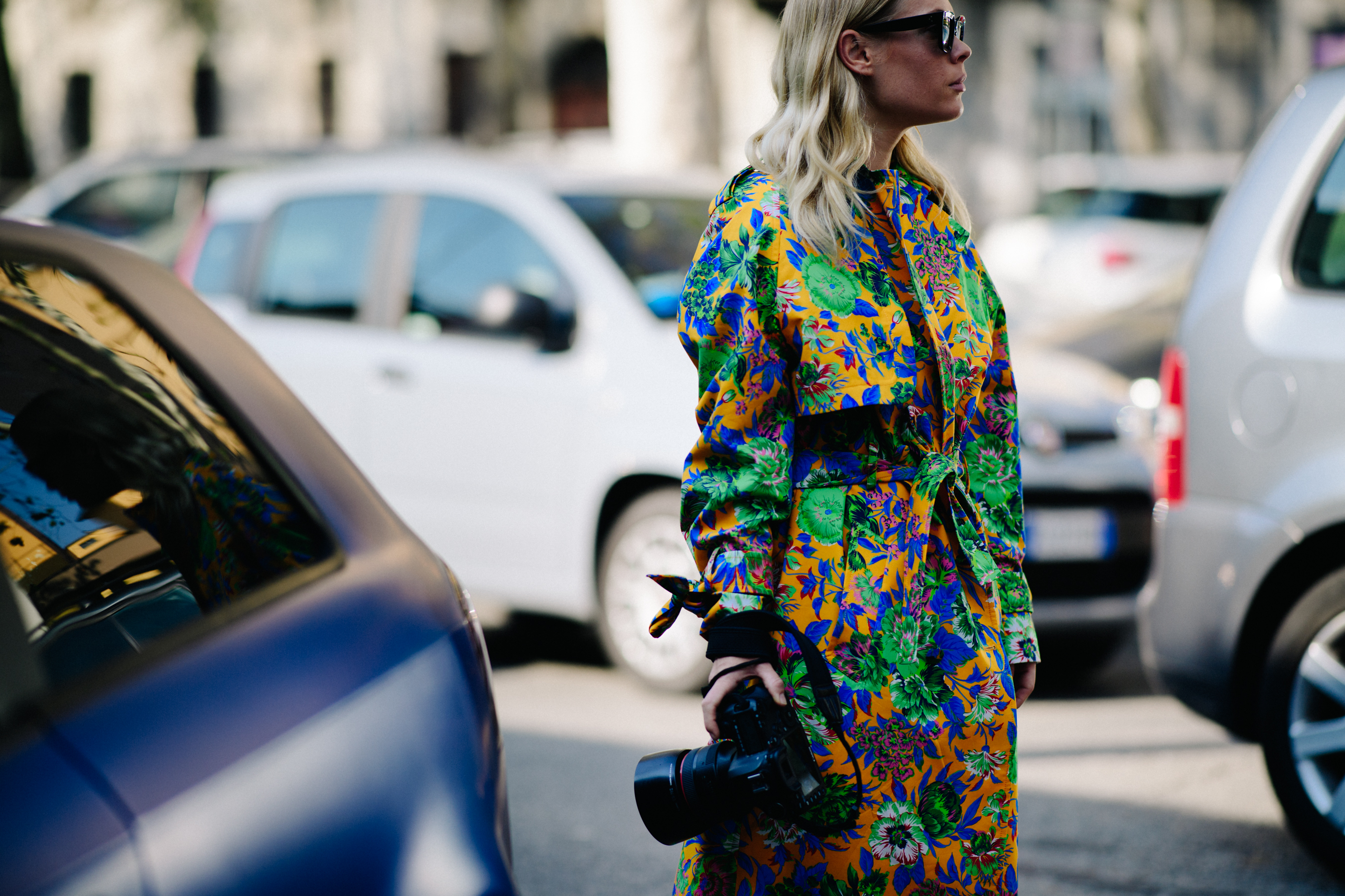 Journalist wearing bright dress
