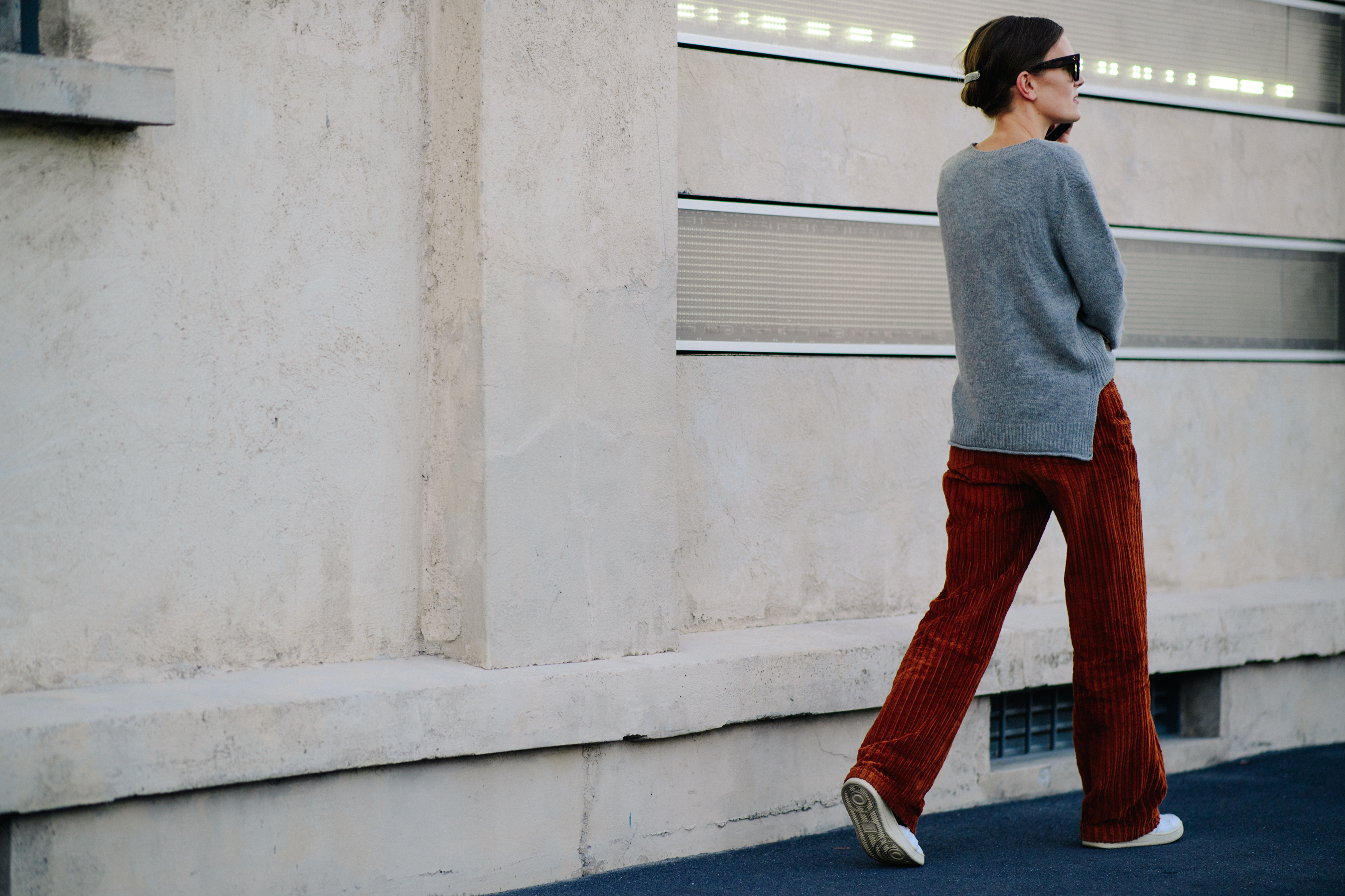 Editor wearing brown cord trousers