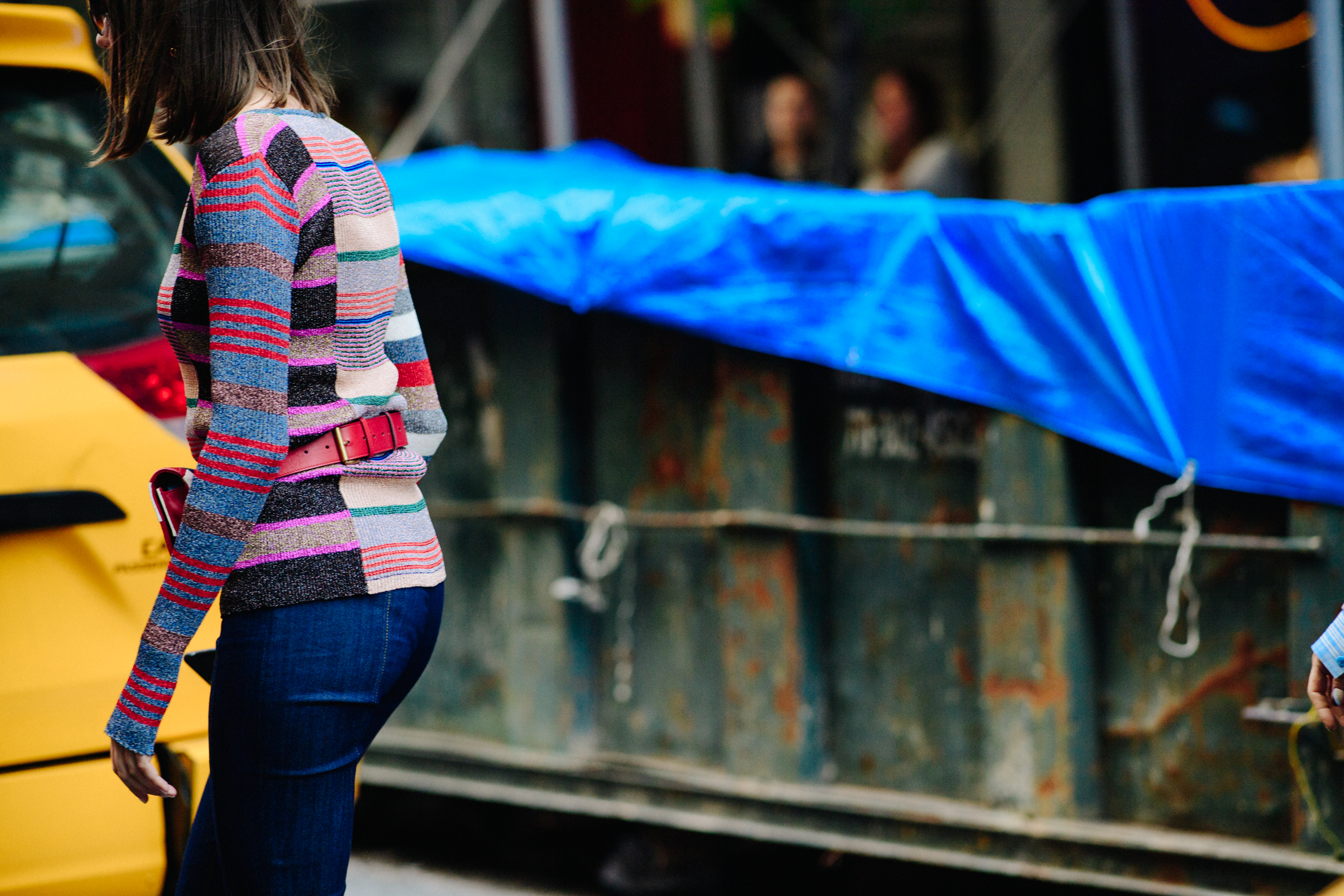 Woman wearing colourful sweater