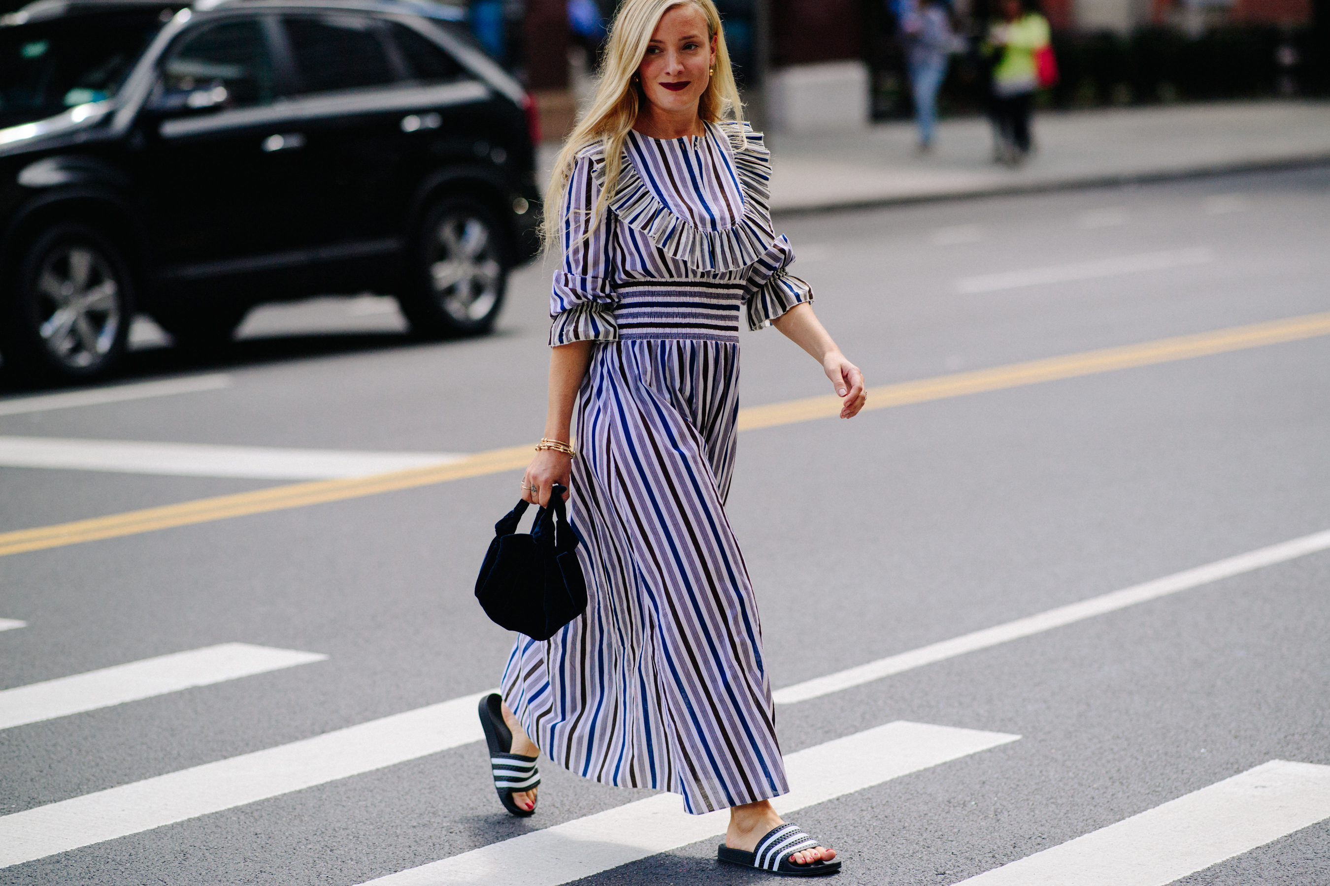 Woman wearing long stripy dress