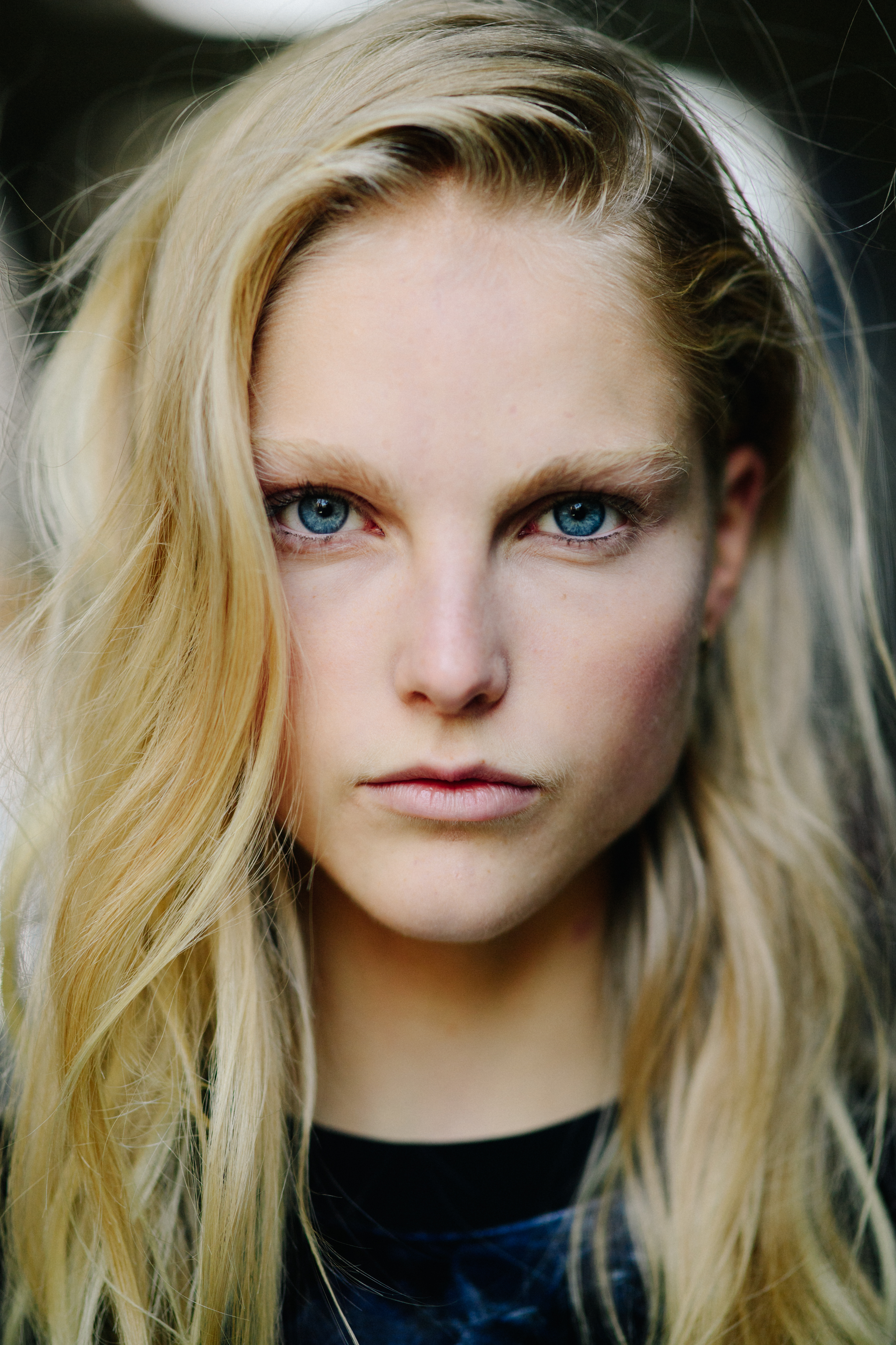 Portrait of a blonde model after a show