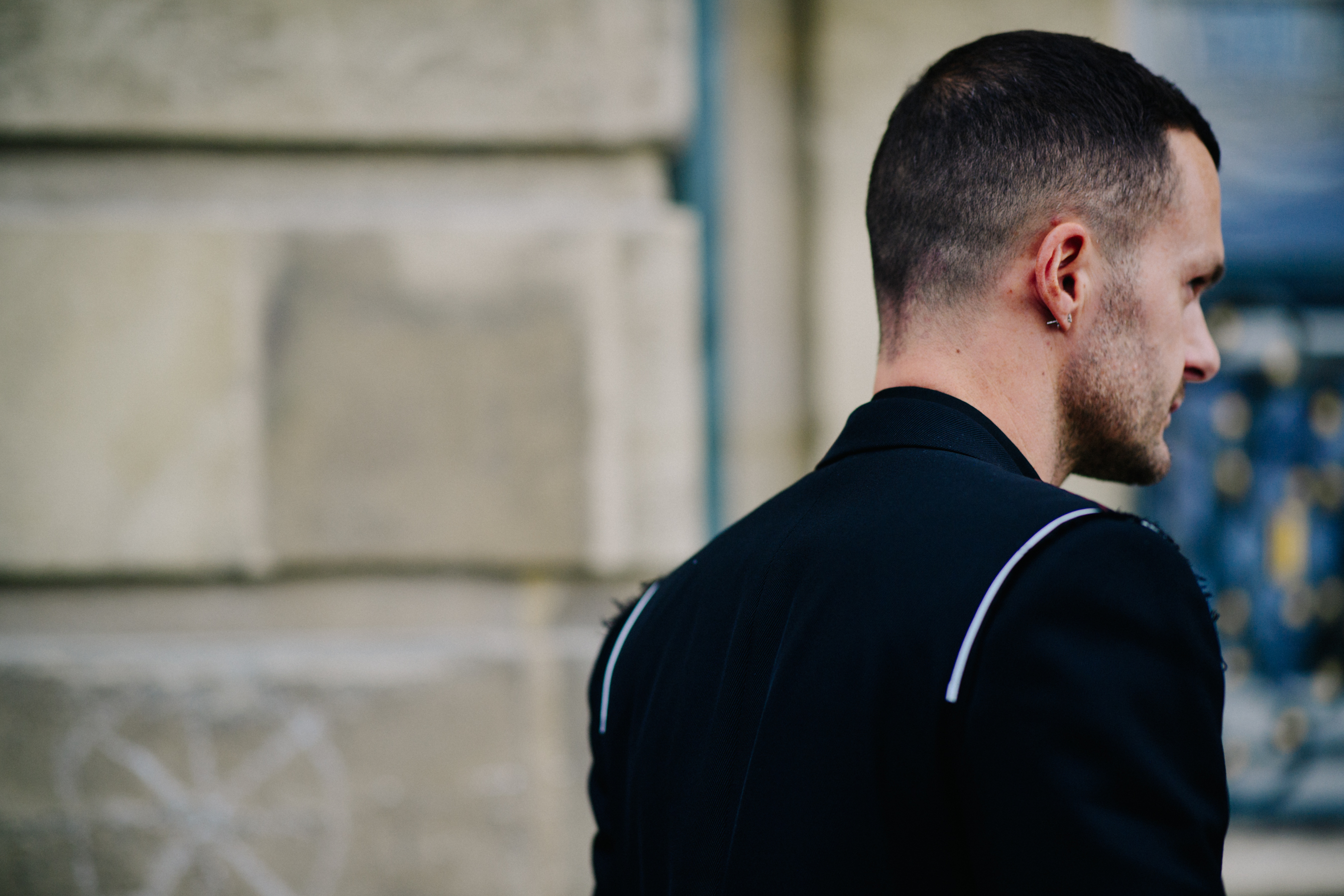 Dior Homme creative director wearing black