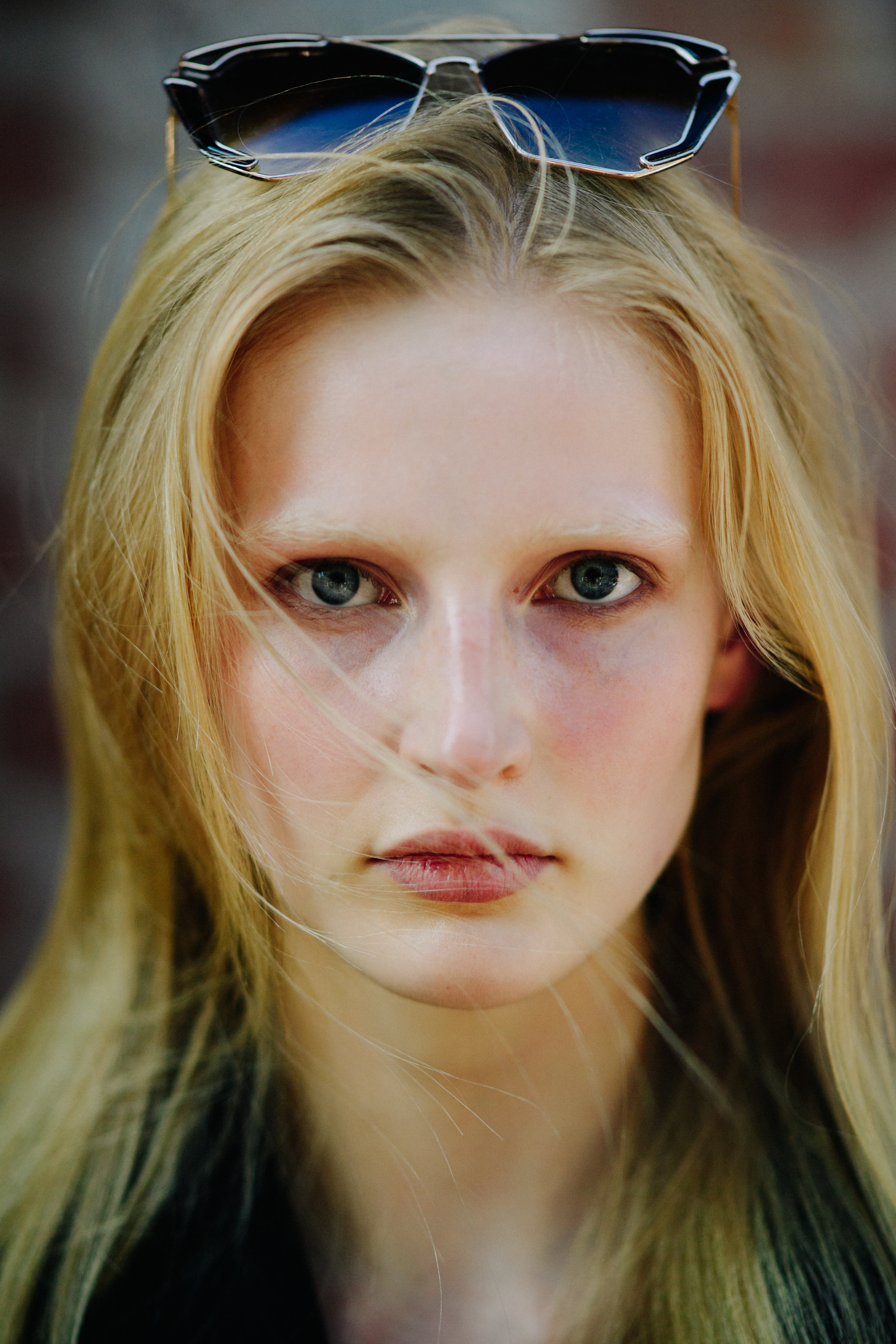 Portrait of model with sunglasses on head